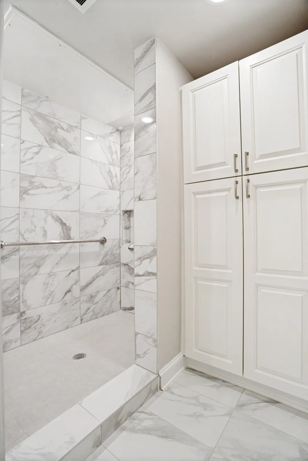 Linen storage cabinet in Primary Bath