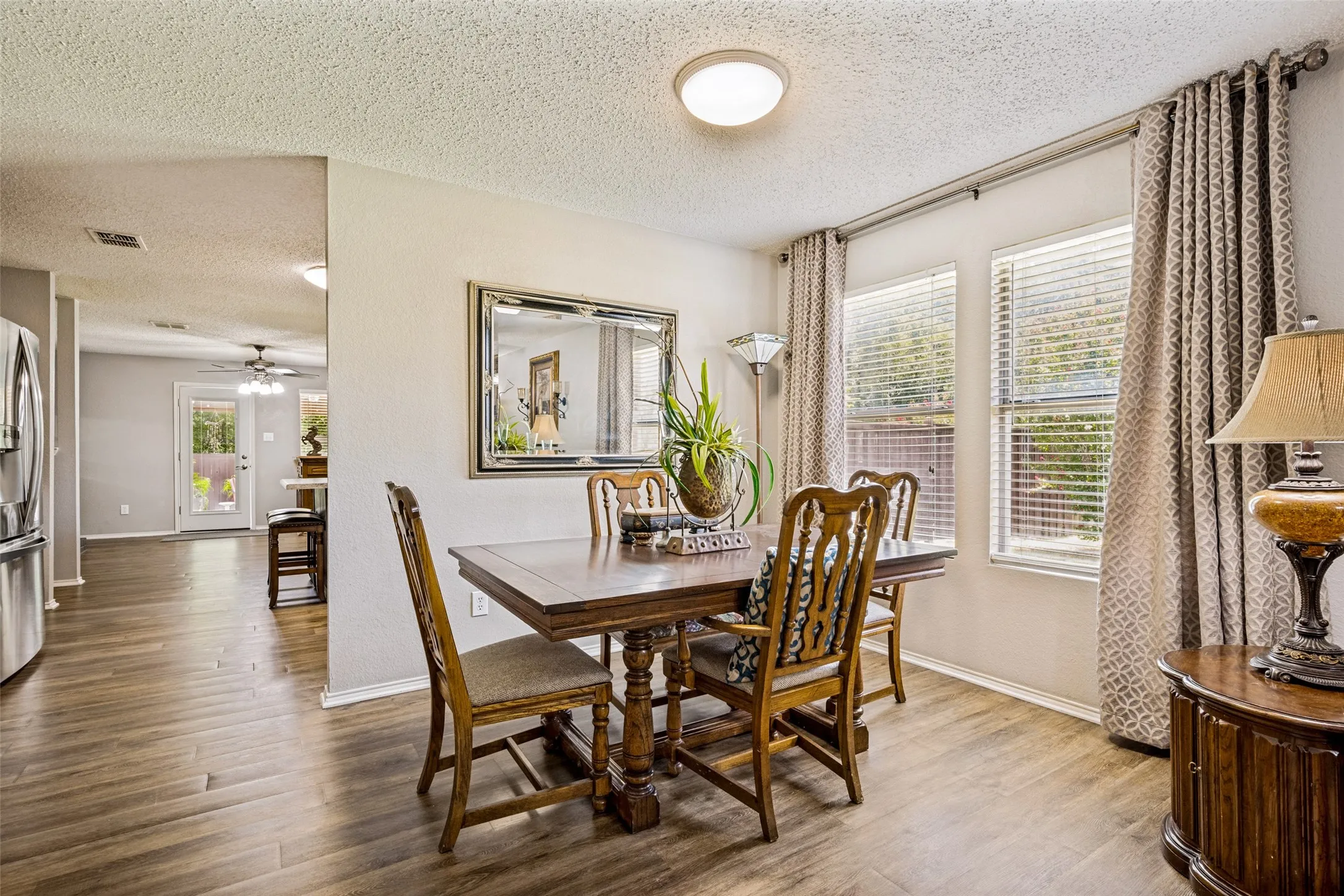 Light and bright Dining area is open to the Formal Living Area.