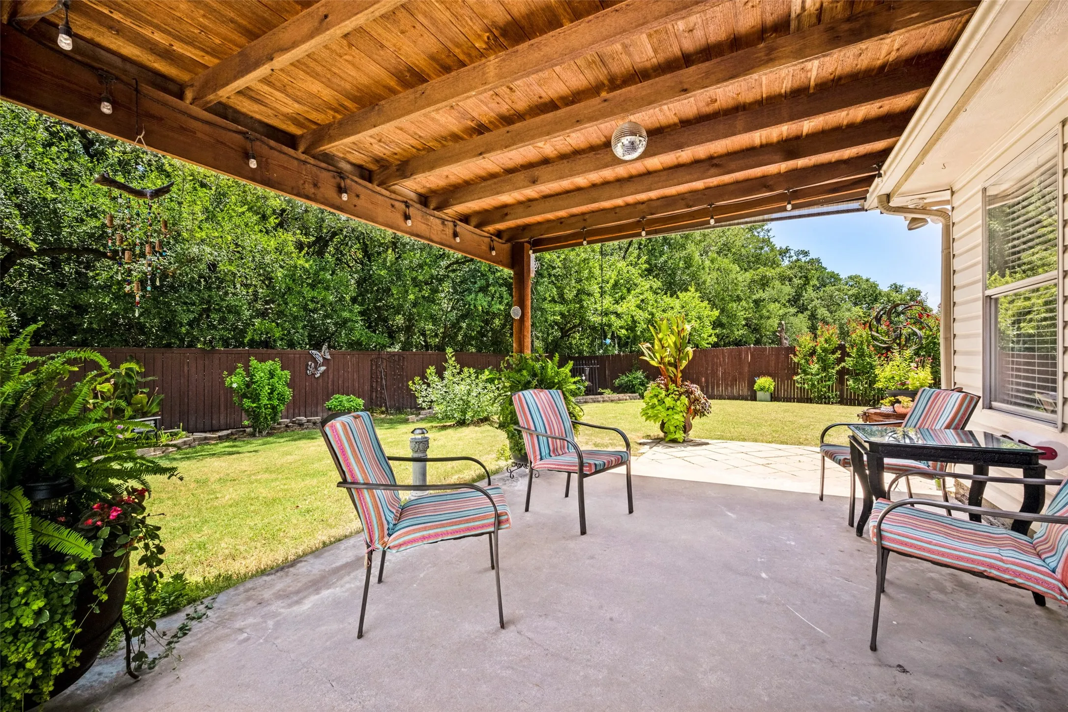 How relaxing does this look? Private, huge yard promotes outdoor living.