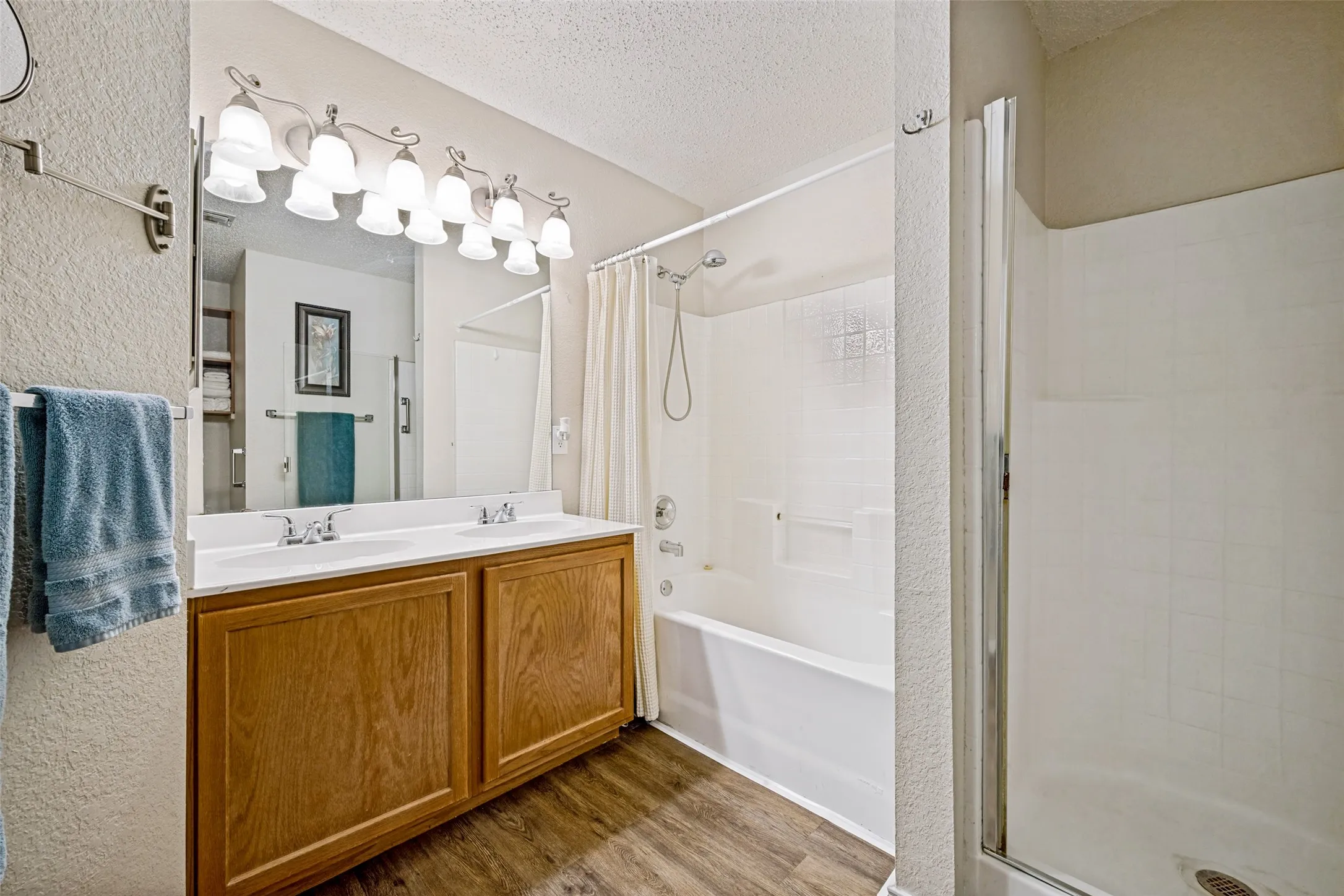 Primary Bathroom has dual sinks, garden tub, separate shower and built in cabinets.
