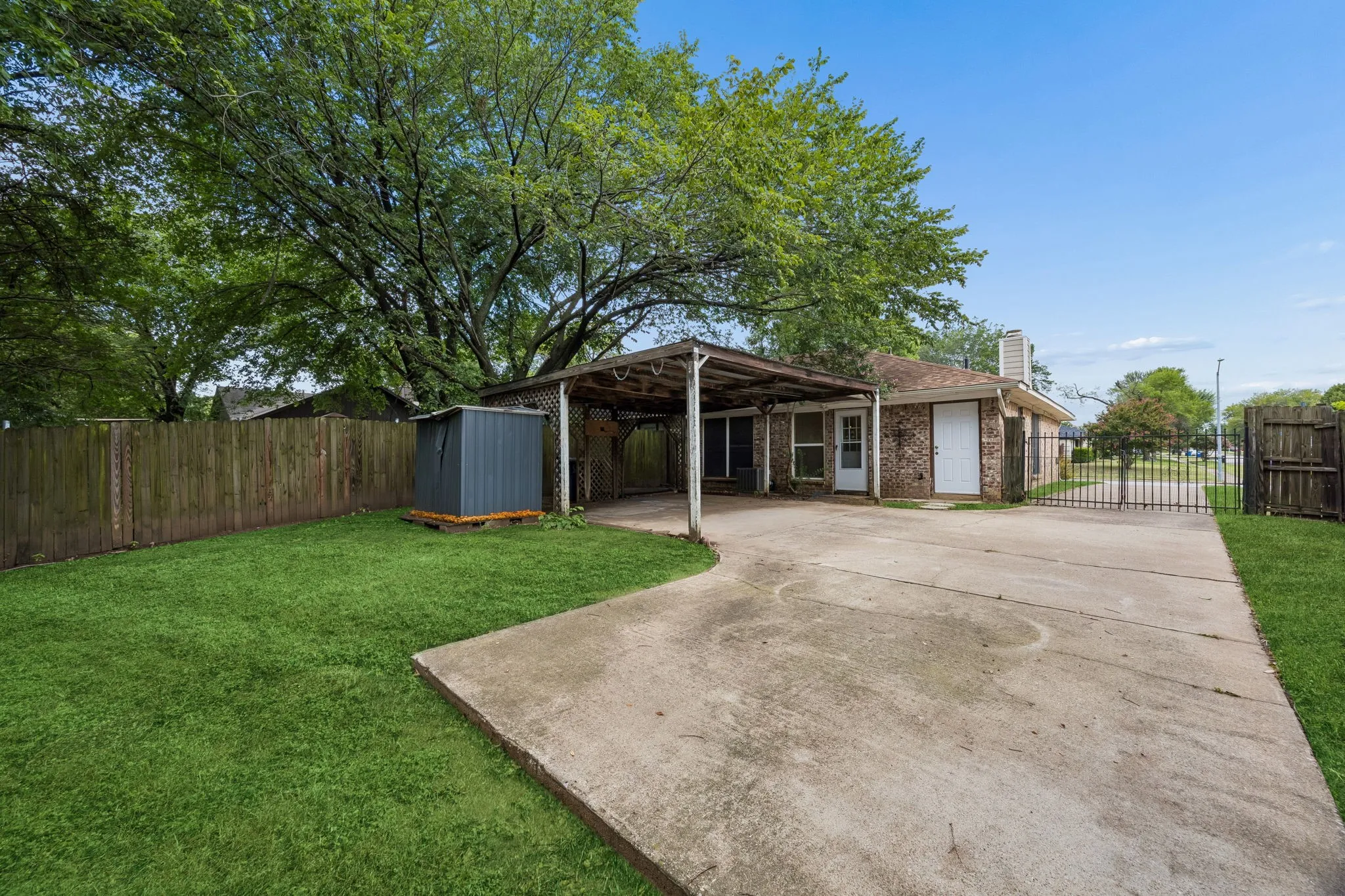 Extended Driveway with privacy gate - Could house an RV