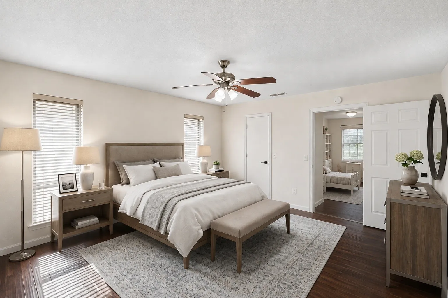 The spacious primary bedroom offers abundant natural light and ample room for a complete furniture arrangement.
Virtually Staged -- original image may have been altered by AI.