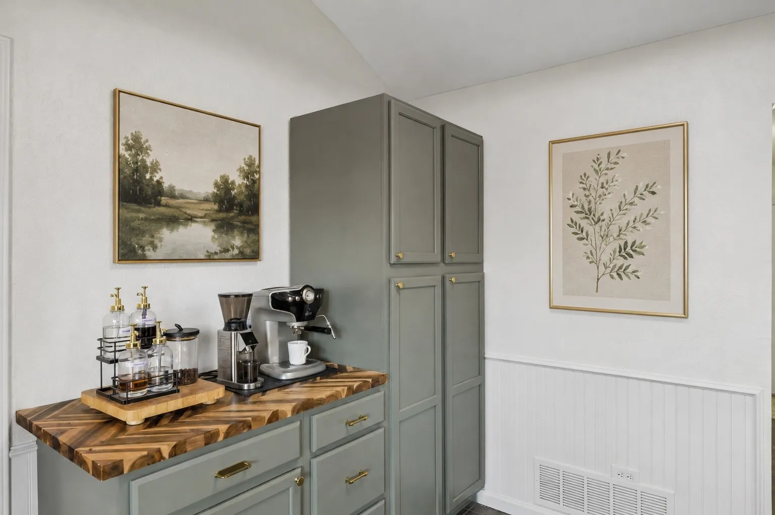 A custom built-in coffee bar combines dedicated beverage service, pantry storage and stylish cabinetry in one thoughtfully designed feature.
Virtually Staged -- original image may have been altered by AI.
