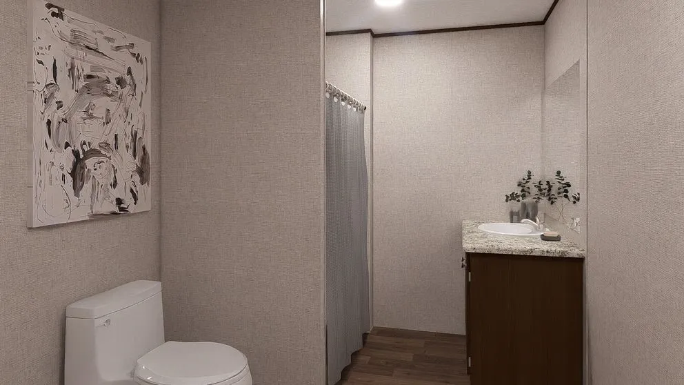 Bathroom featuring a white toilet, wood-finish flooring, a single vanity with a white countertop, and a shower with a privacy curtain