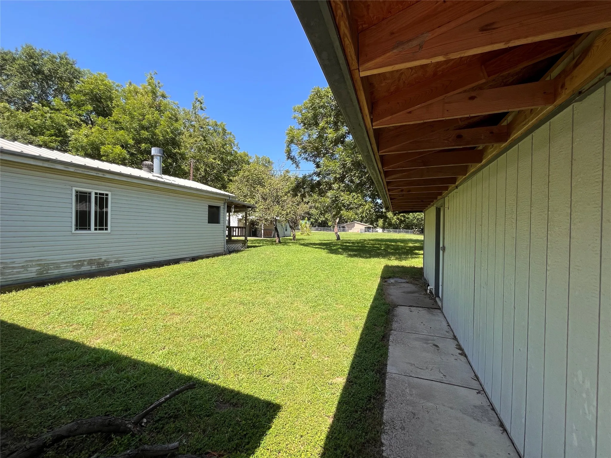 Side of house and workshop