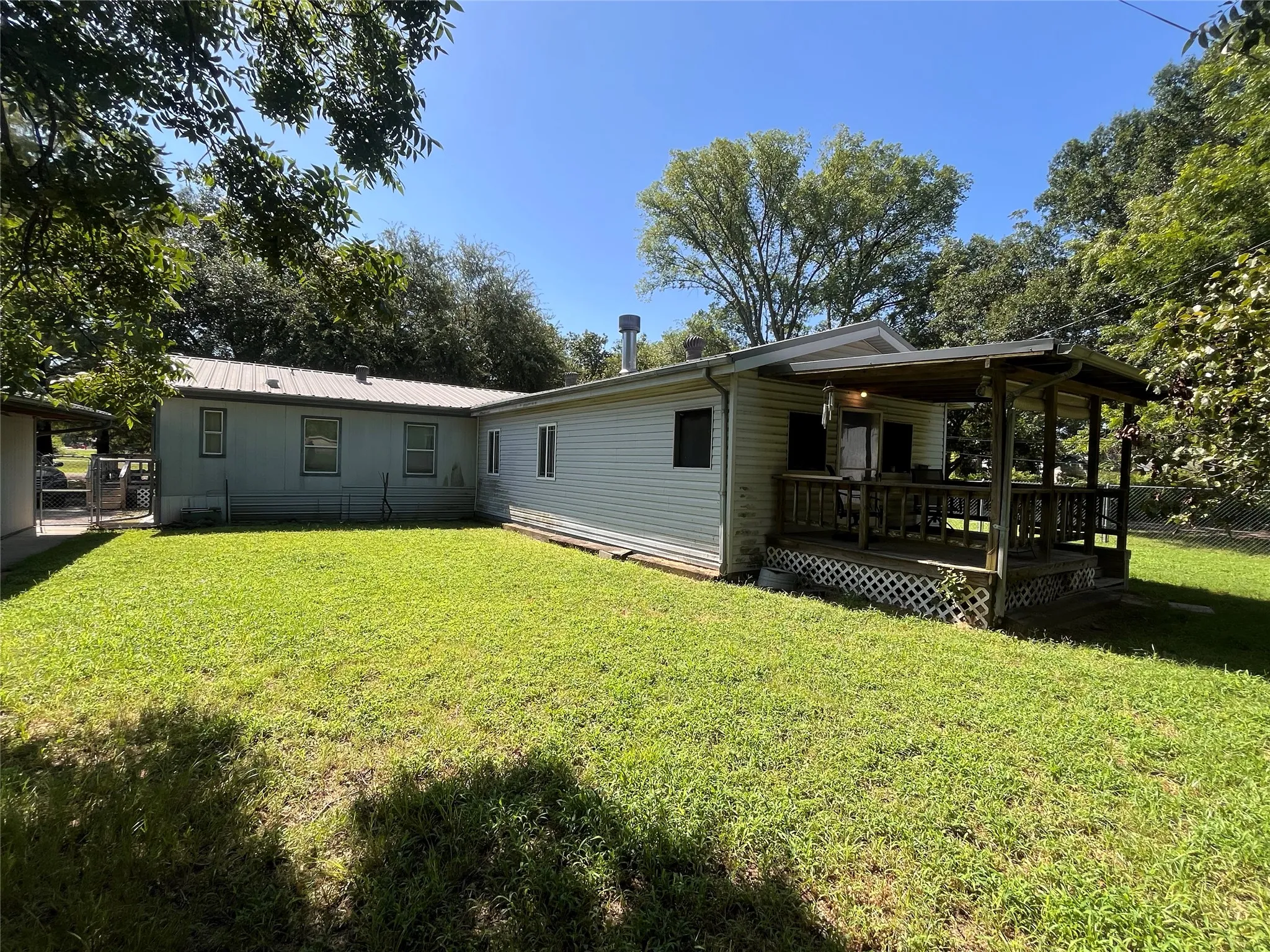 Covered porch and side yard