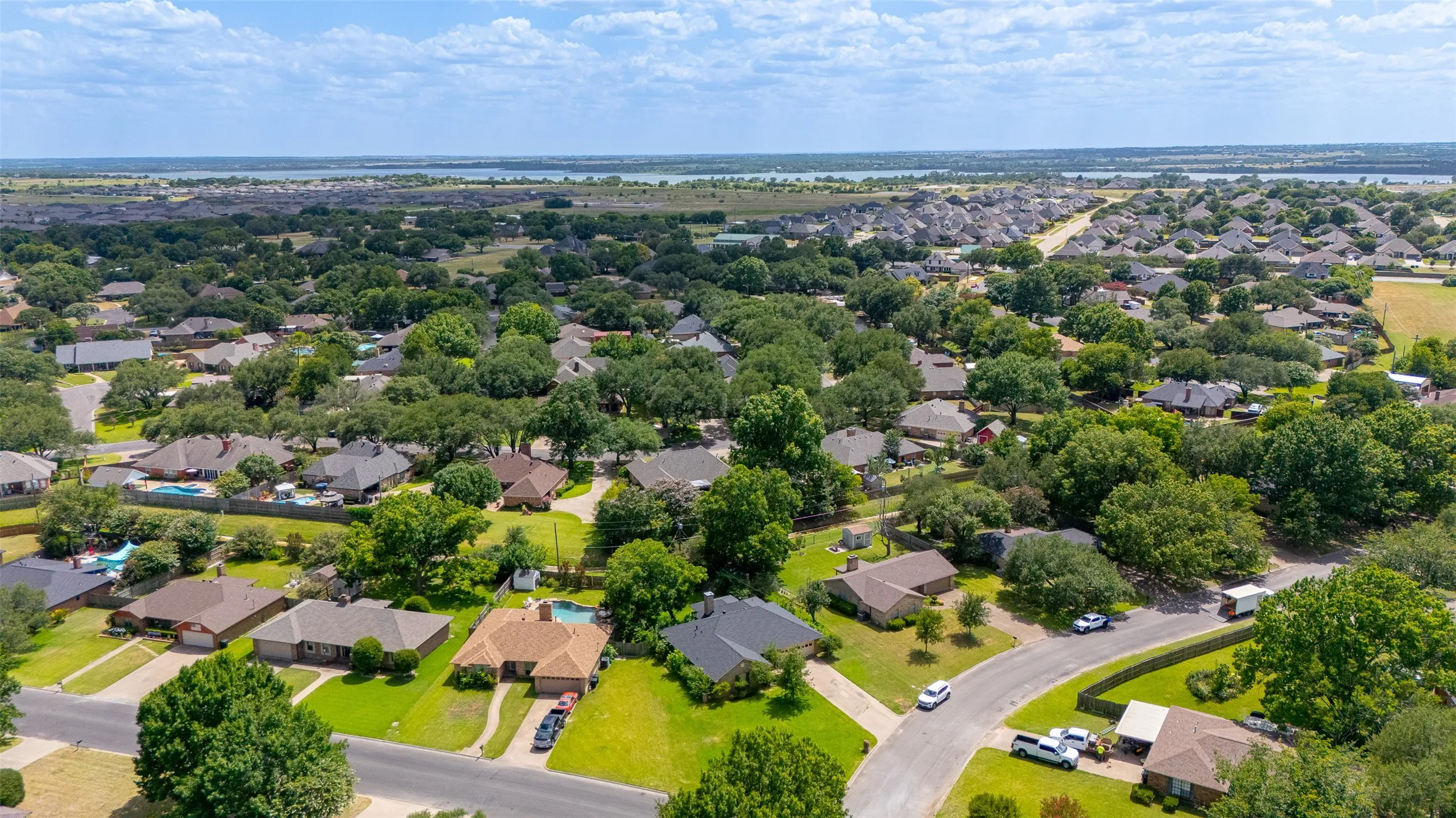 Aerial perspective showcasing a residential neighborhood with numerous single-story homes