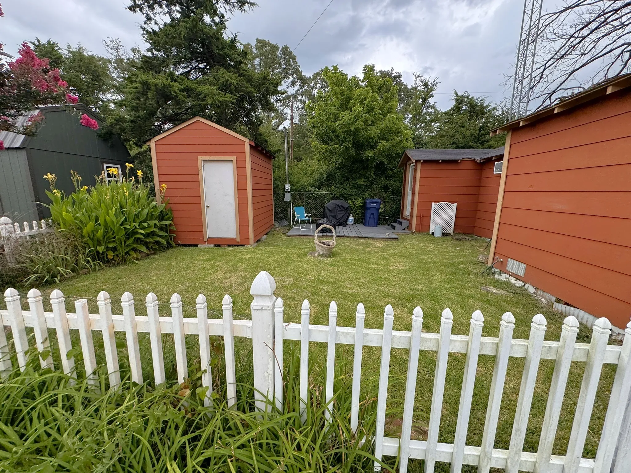 Fenced Yard with storage building