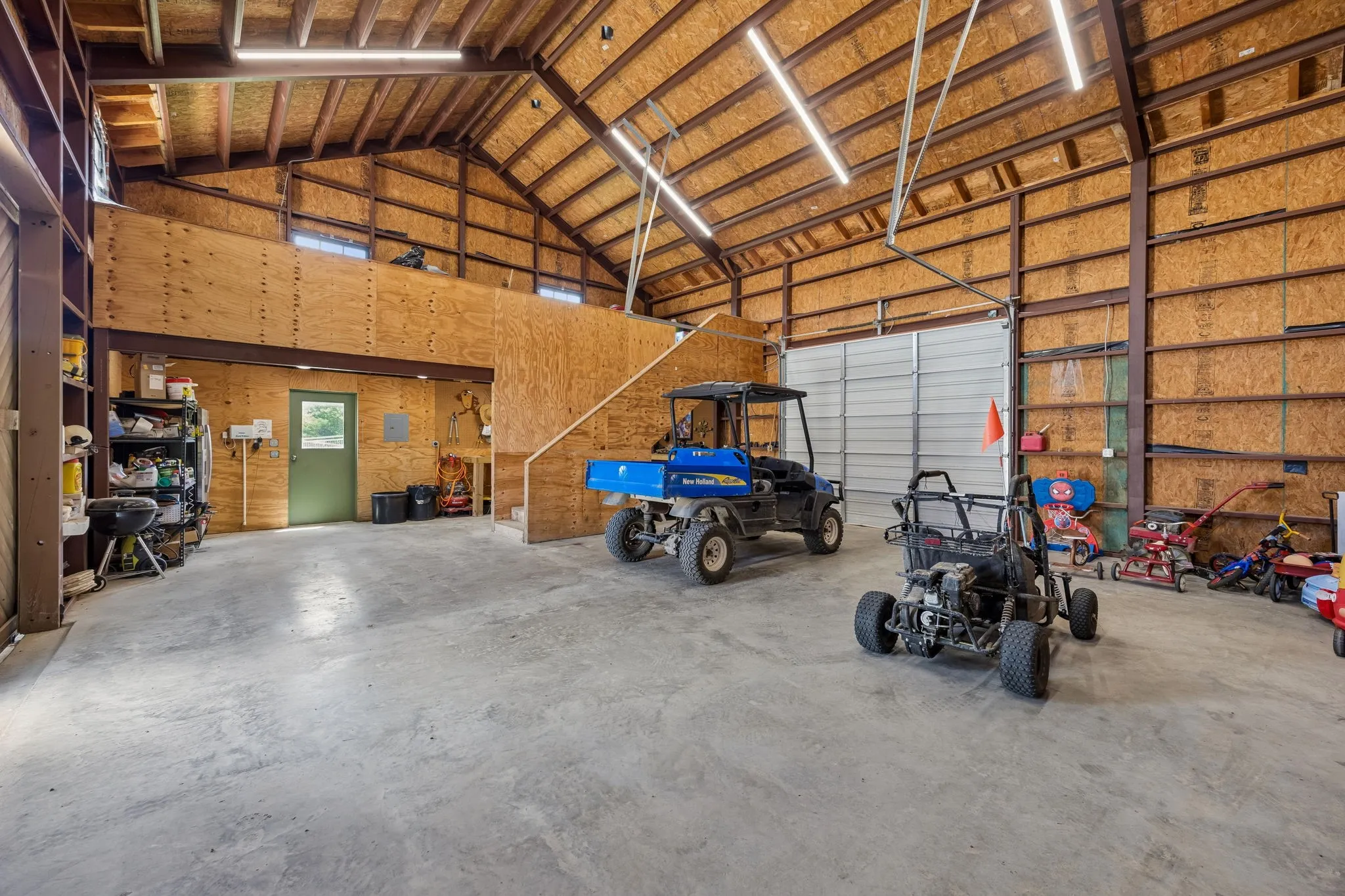 The barn features drive-through capability, along with a loft area for an office or storage area.