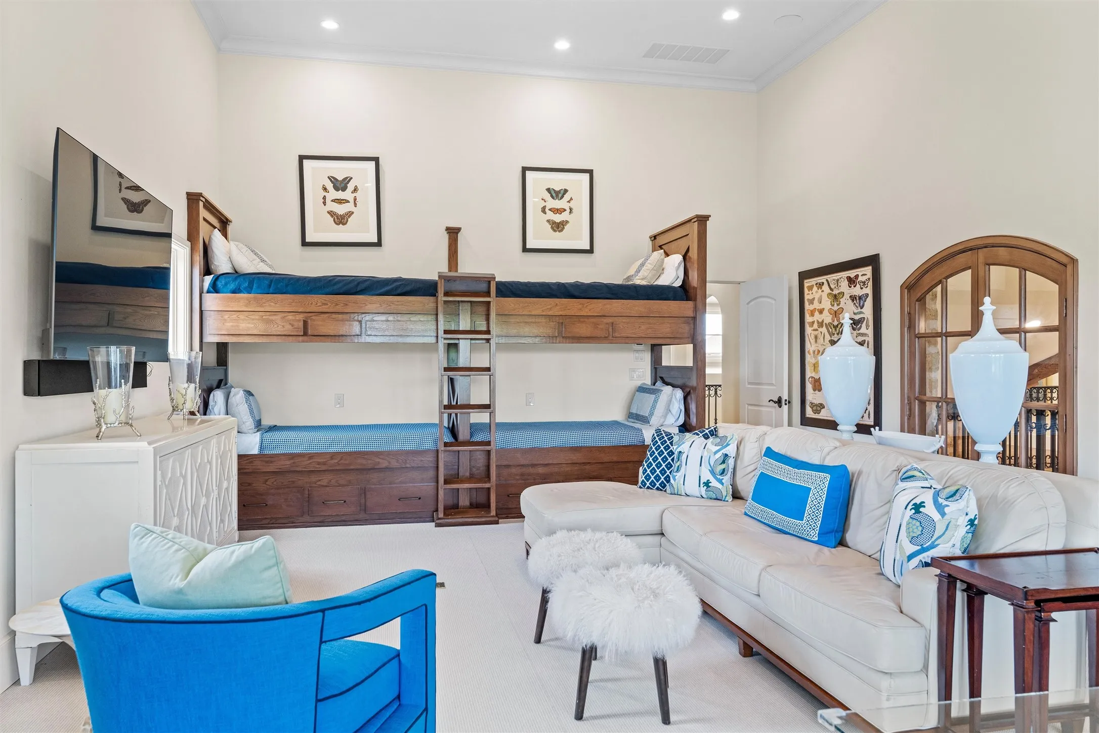 The family room also doubles as a bunk room, with four built in bunks and room enough for family game night and kids' gaming area!