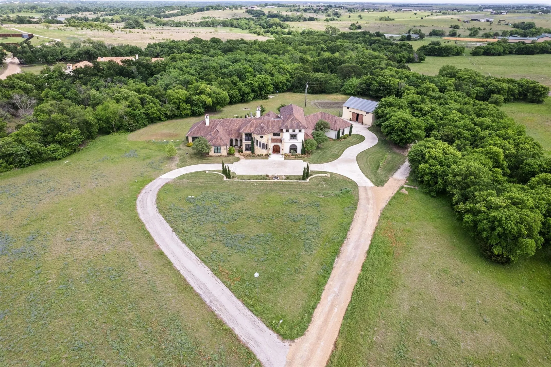 The well planned estate features a circular driveway that is actually in the shape of a heart, as one visit will allow you to fall in love with this unique property.