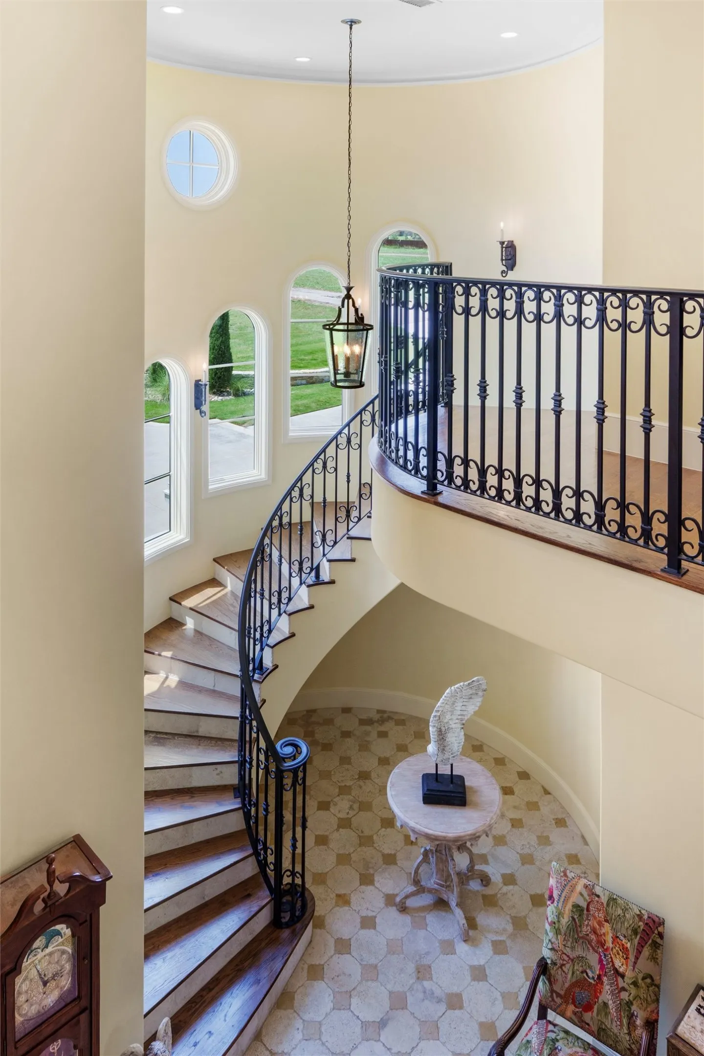 One of the most dramatic features of the home is the curved staircase within the castle-like turret.