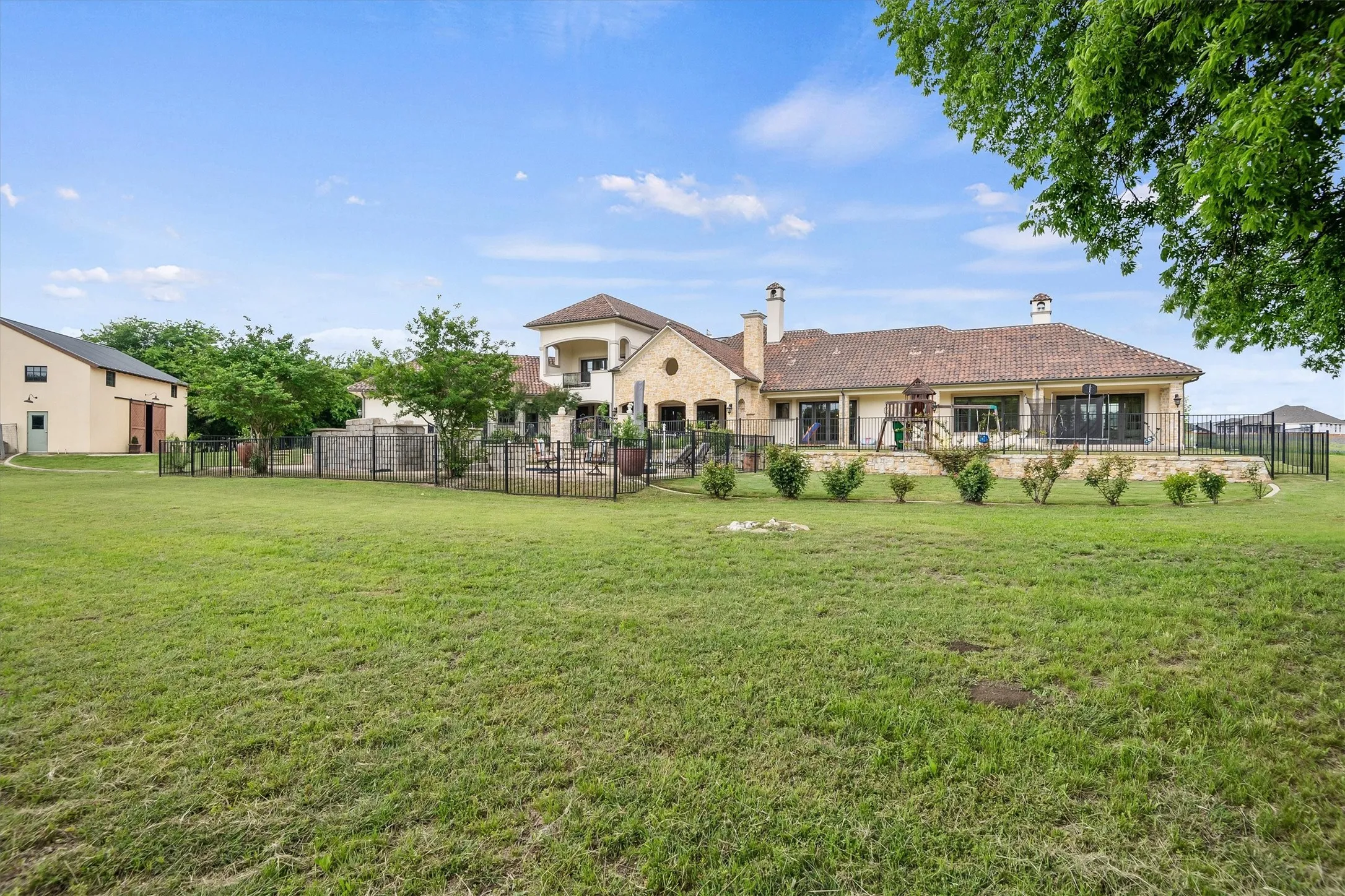 With over 18 acres, the Tuscan-inspired estate provides the privacy you crave, but also the room to fulfill your dreams of outdoor adventures.