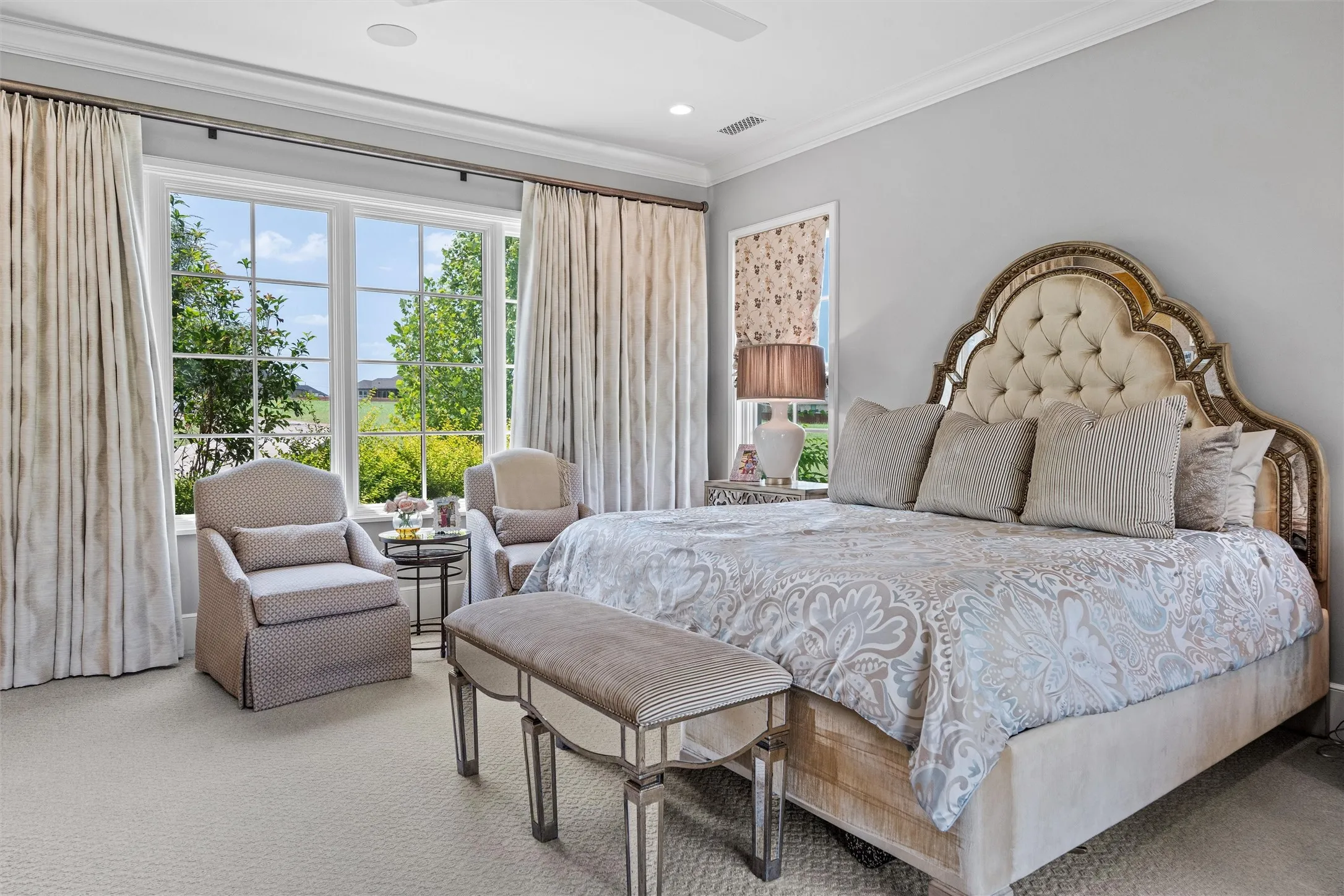 The primary suite provides a cozy, private, yet sun-drenched respite after your busy days.