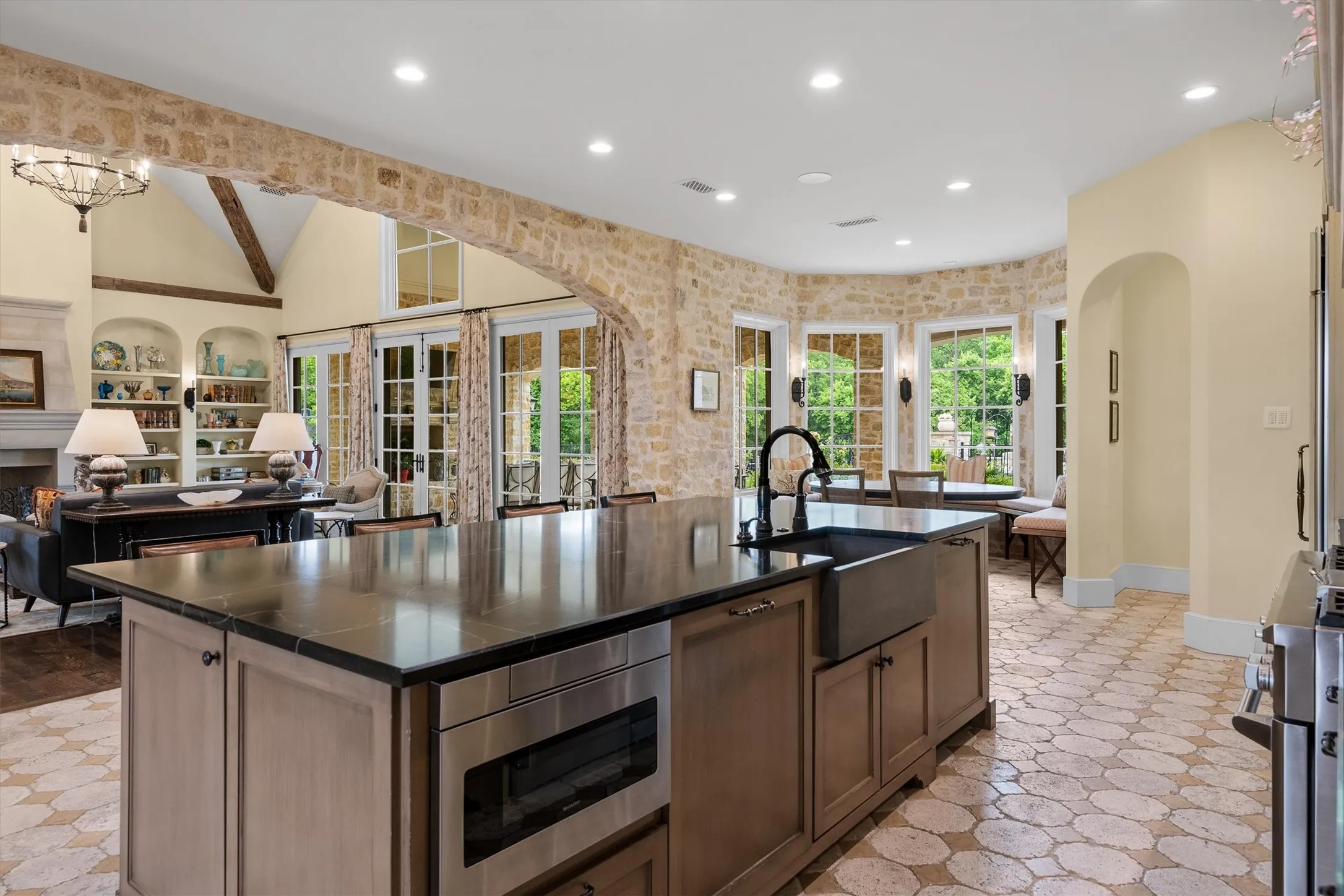 Truly a chef's dream kitchen--featuring an expansive island and looking into the great room.