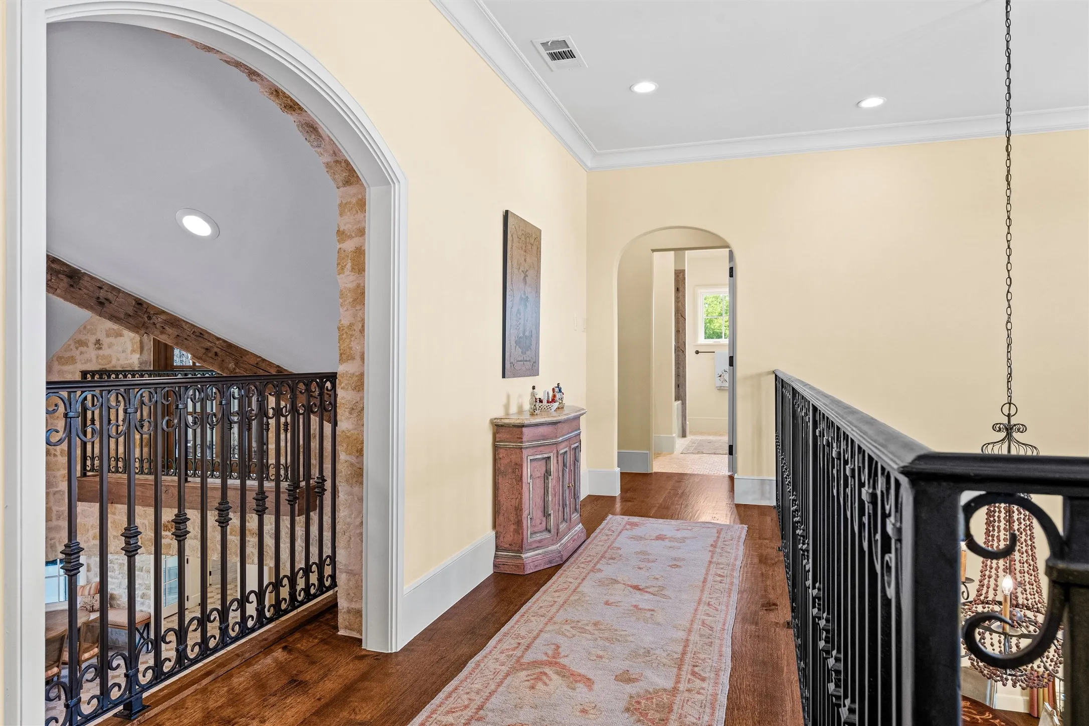 The second floor gallery, overlooking the great room, leading to the luxurious, yet private guest wing.