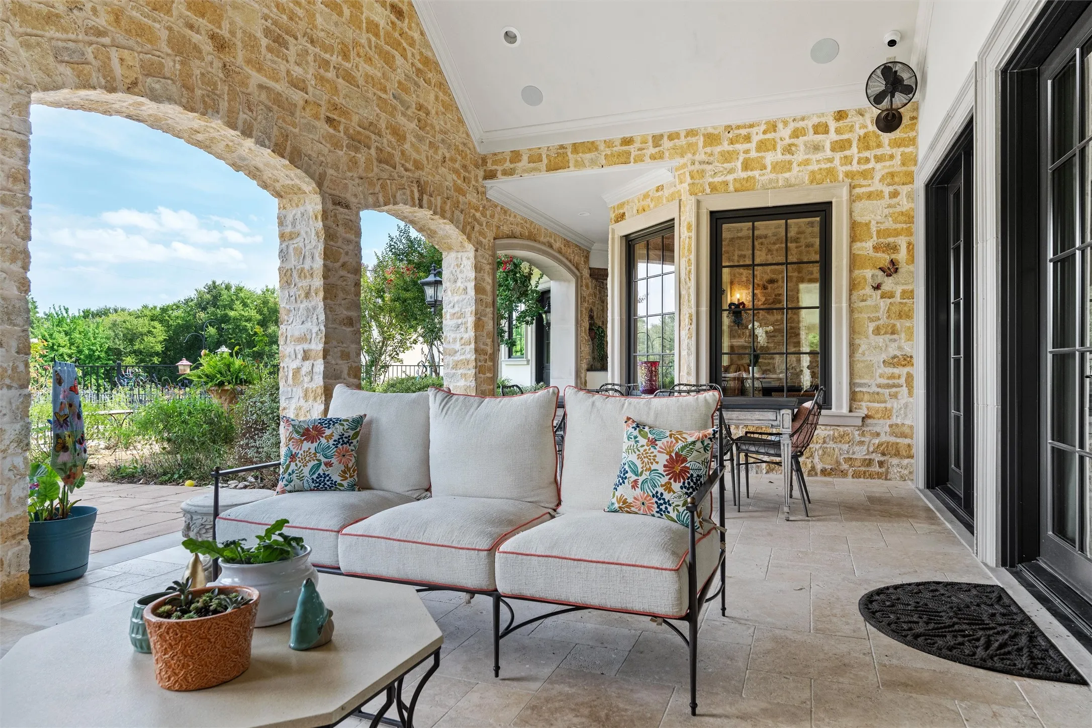 The entertaining options are endless with the extensive covered patio looking out your private acreage.