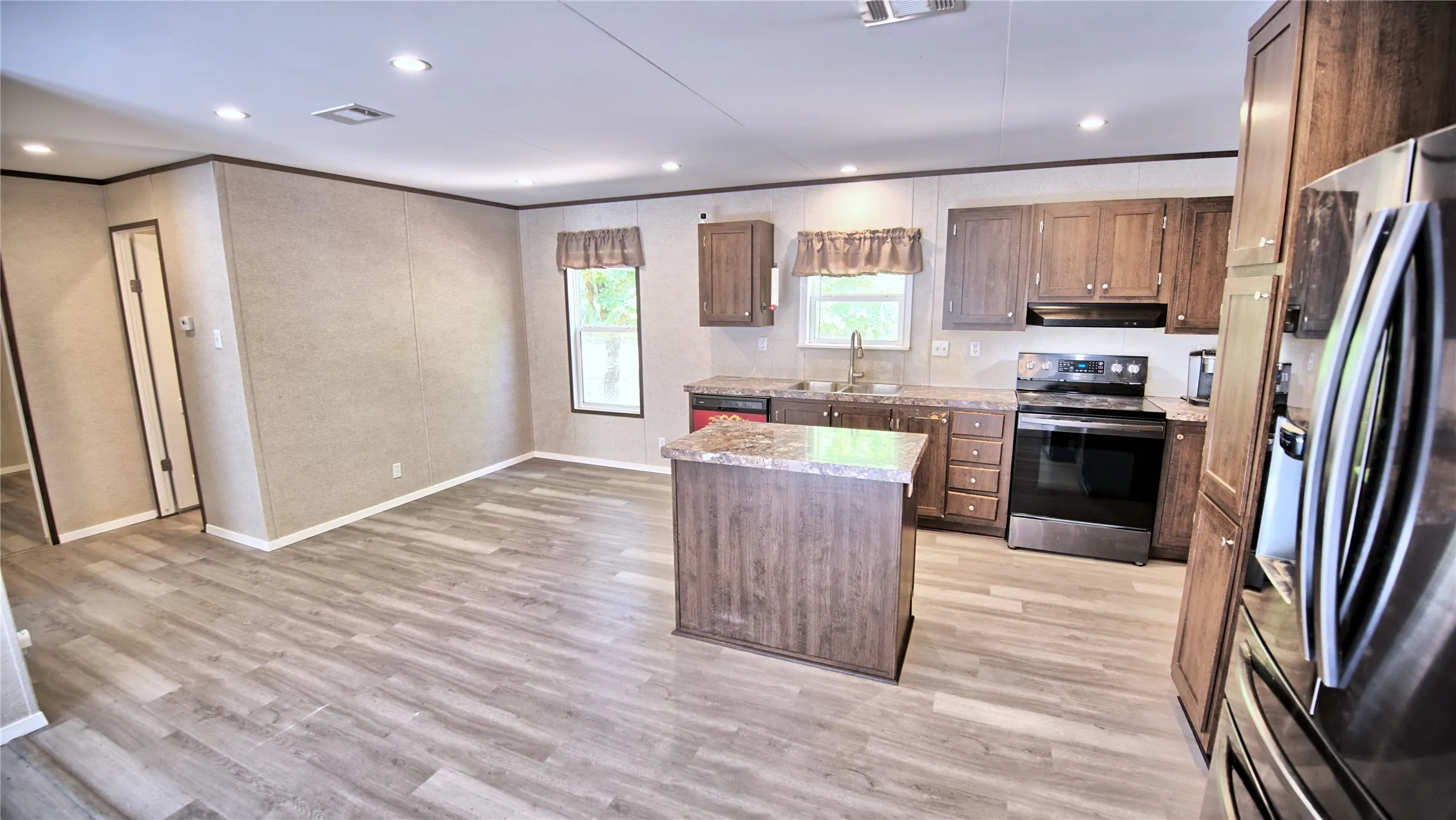 kitchen features small island and dining area