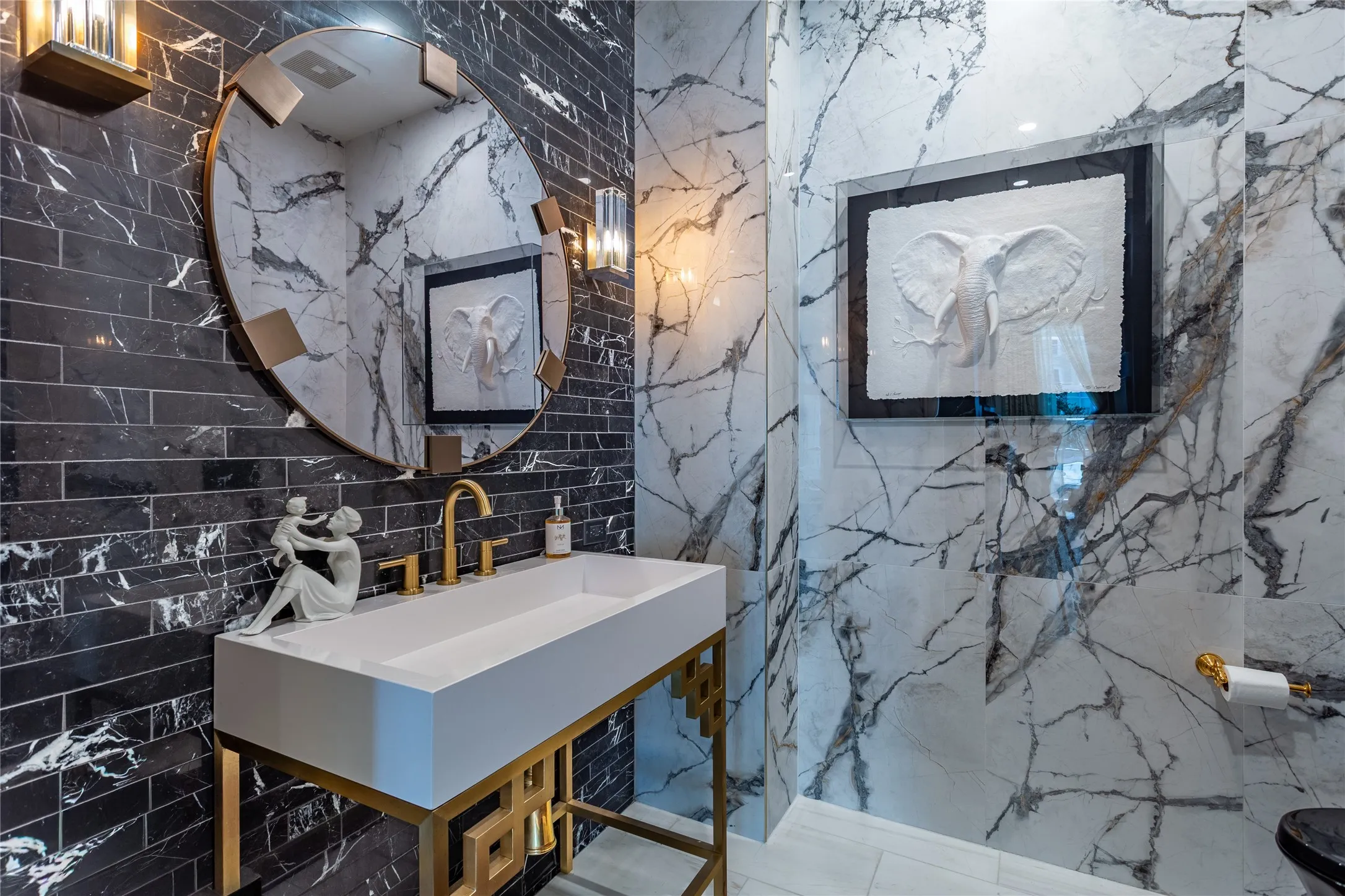 Custom Sink in the marble Powder Room.