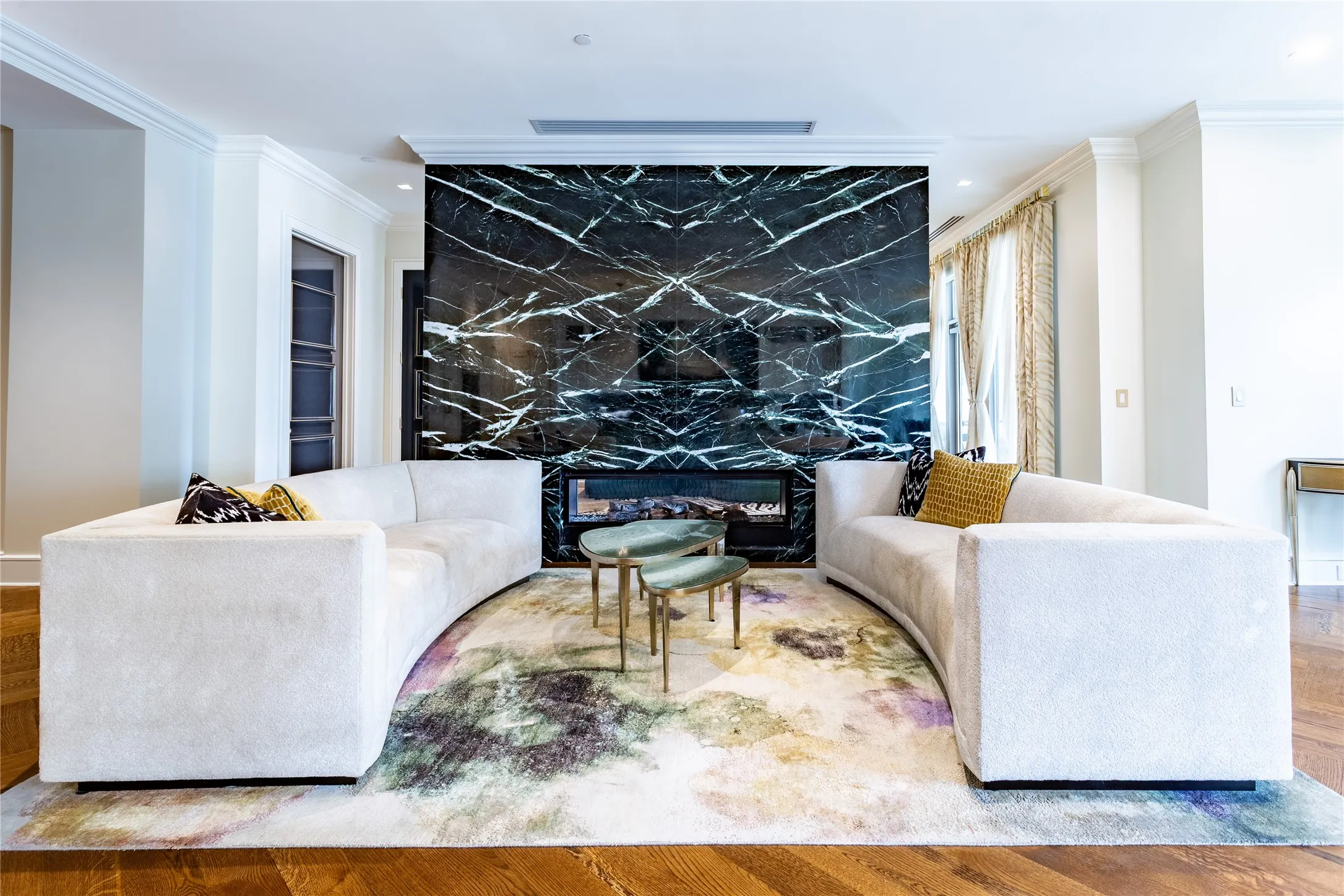 The Stone Collective's Empress Green on the Fireplace Wall