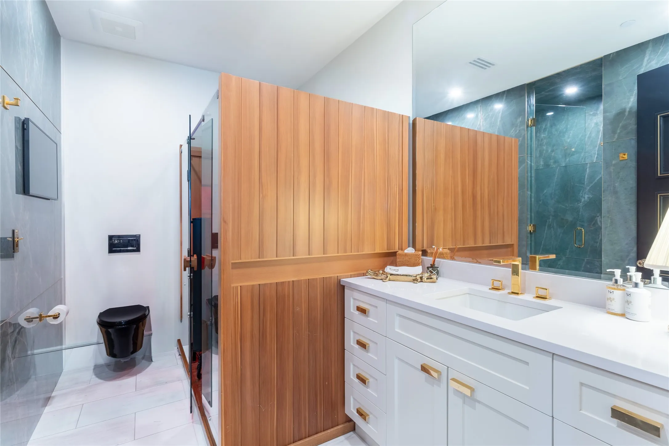 Large Guest Bath has abundant counter space & storage.