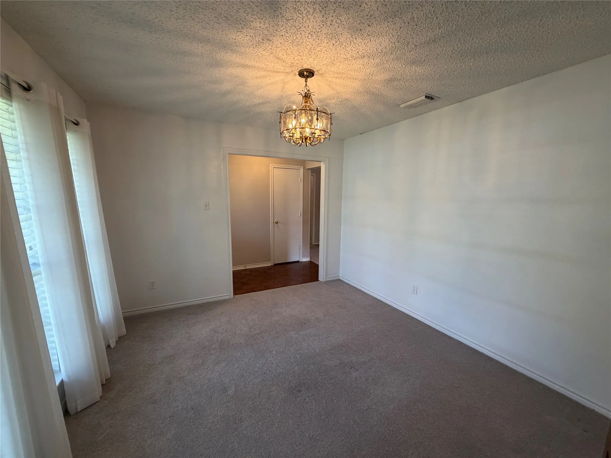 Dining or flex space at front entry of home