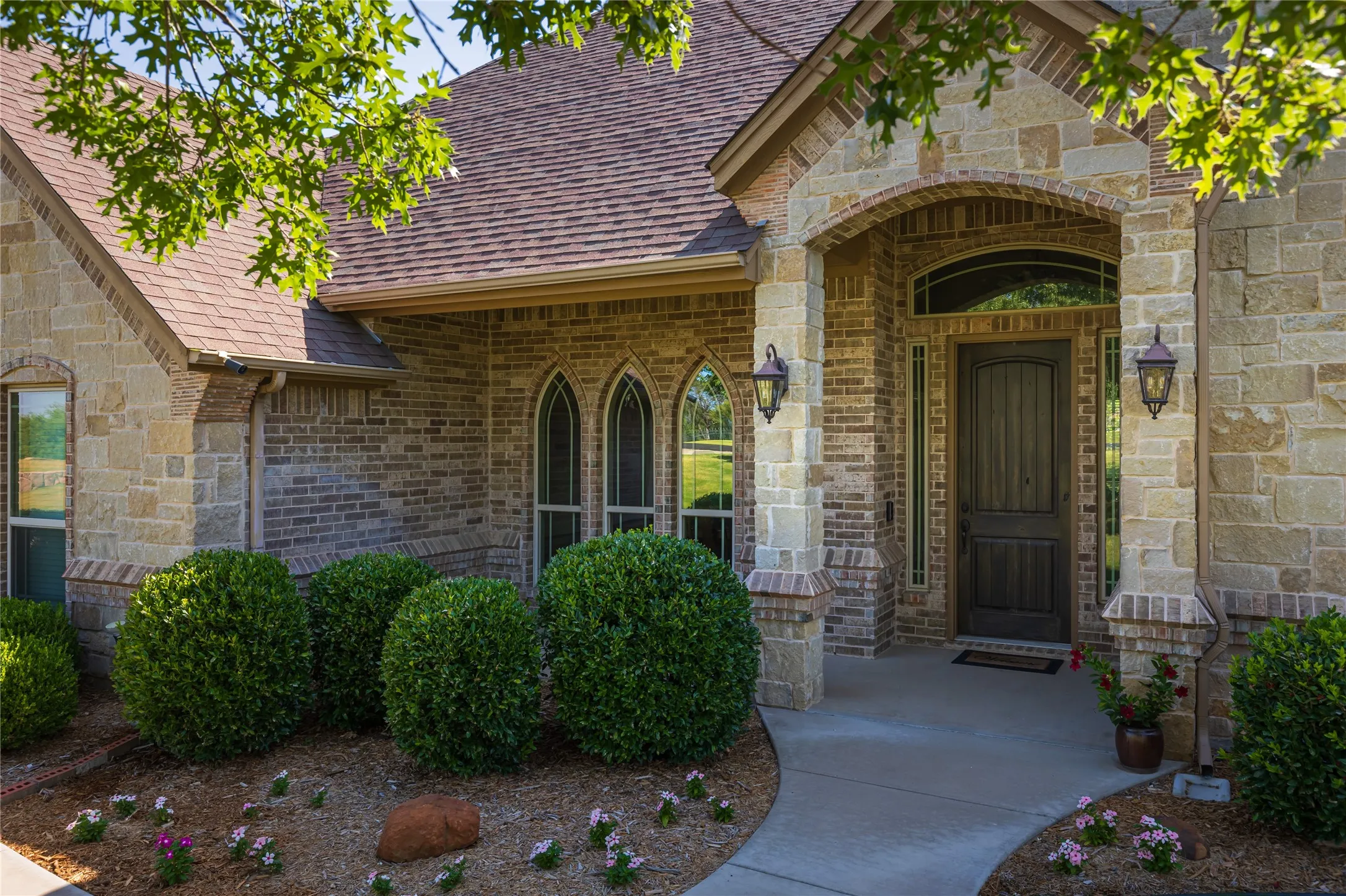 Beautiful landscaping and covered front porch
