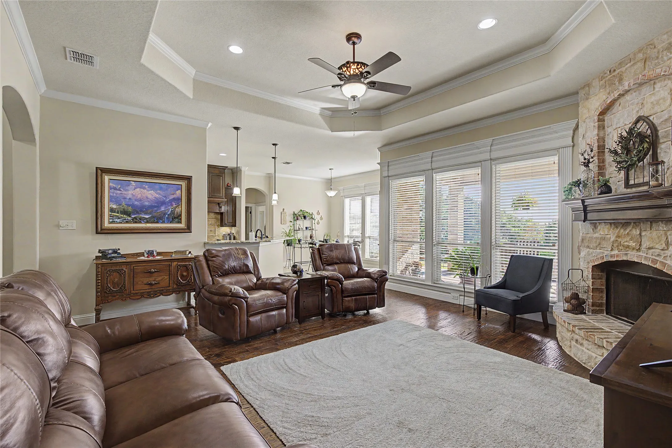 Tray ceiling and crown molding throughout living space