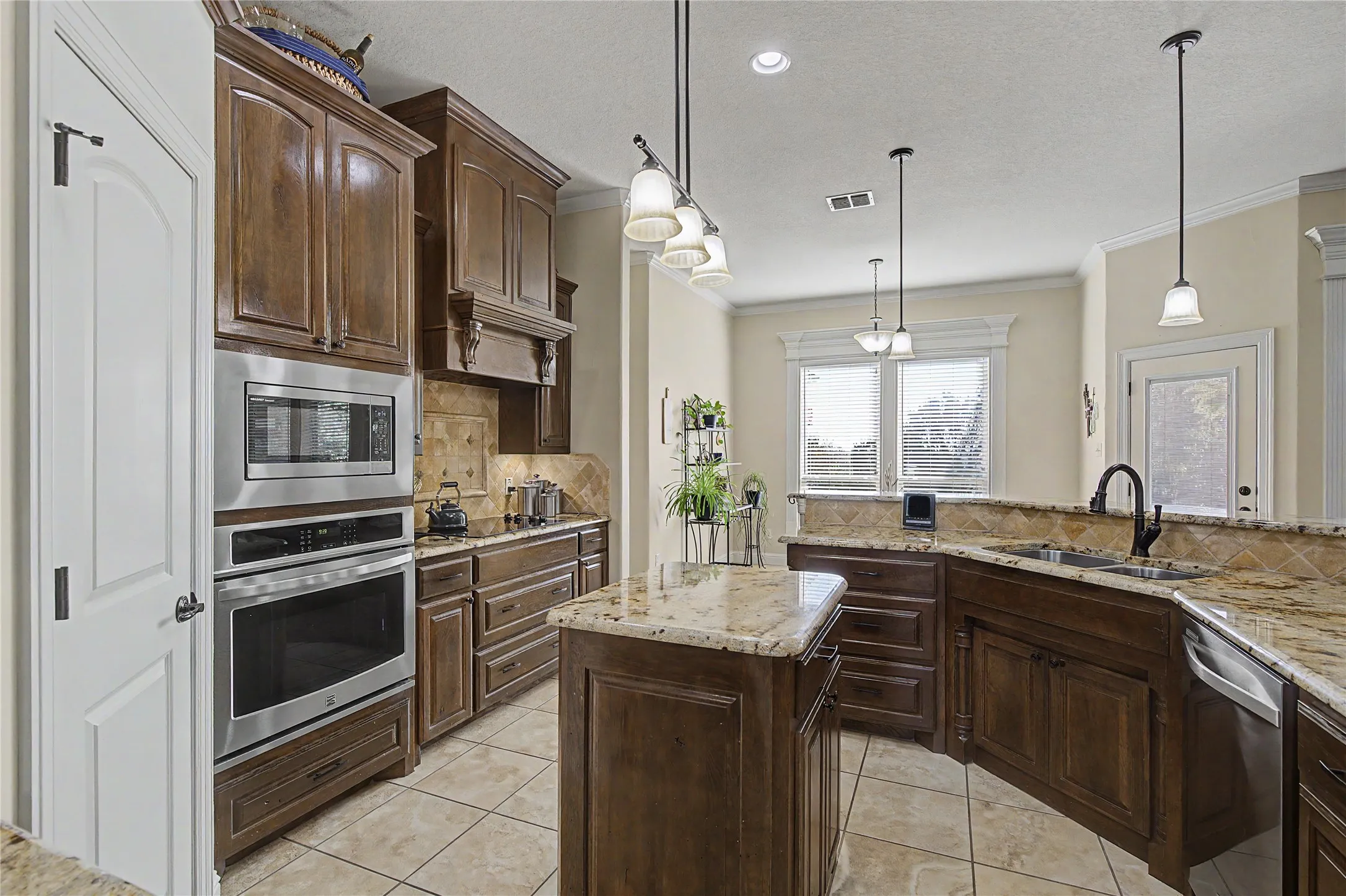 Built-in oven and microwave and walk-in pantry for tons of storage