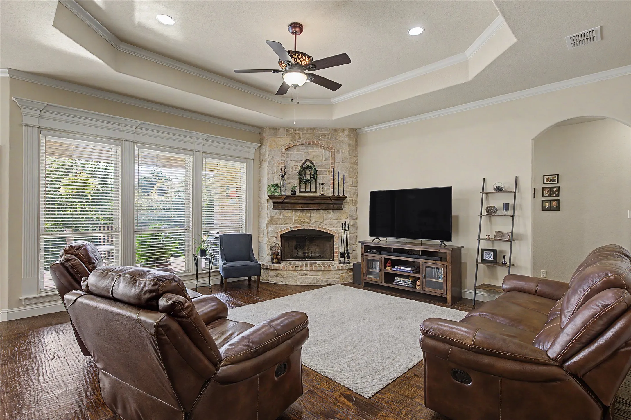 Hand-scraped hardwood floors throughout living space