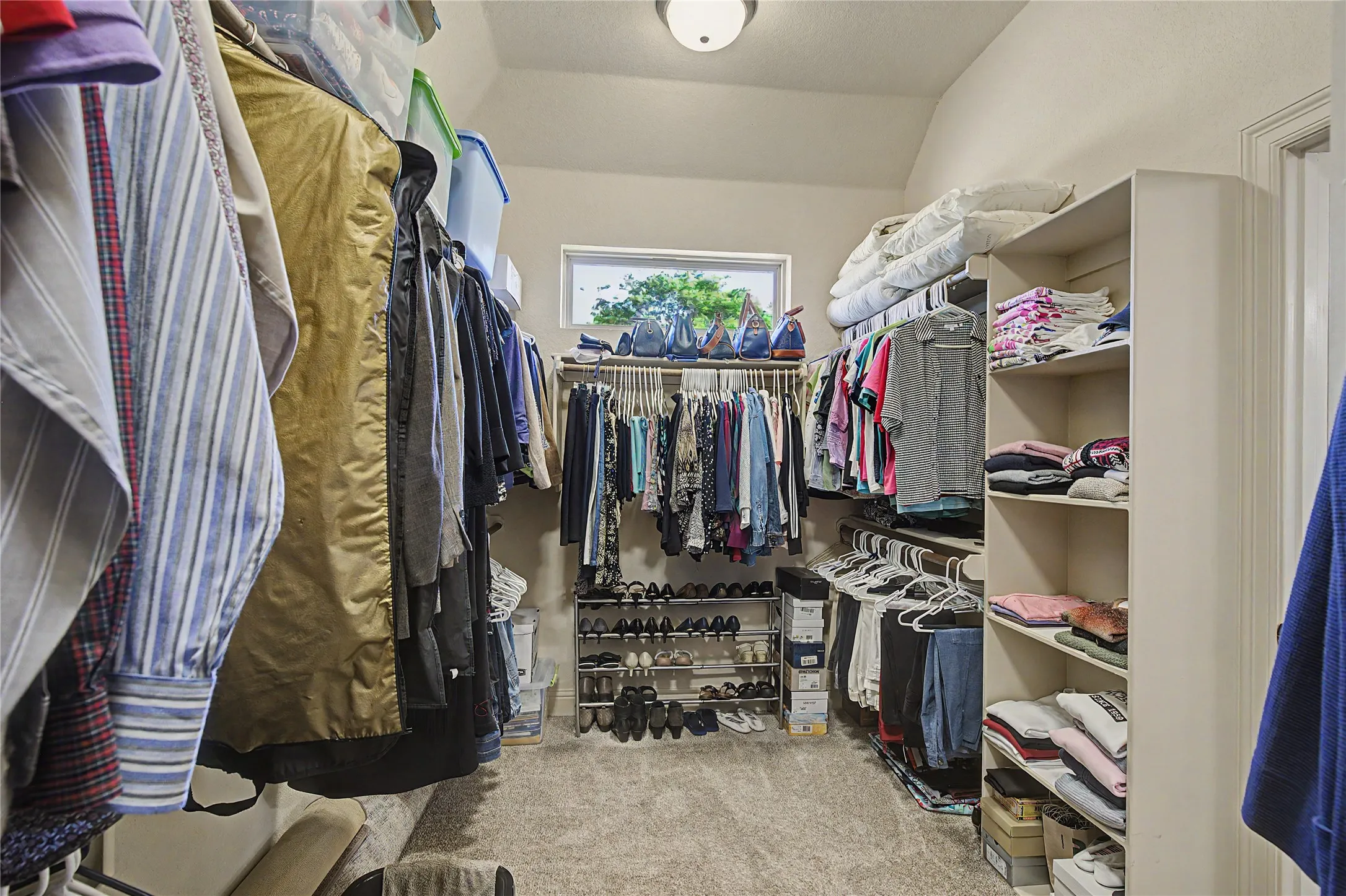 HUGE walk-in closet off primary bathroom