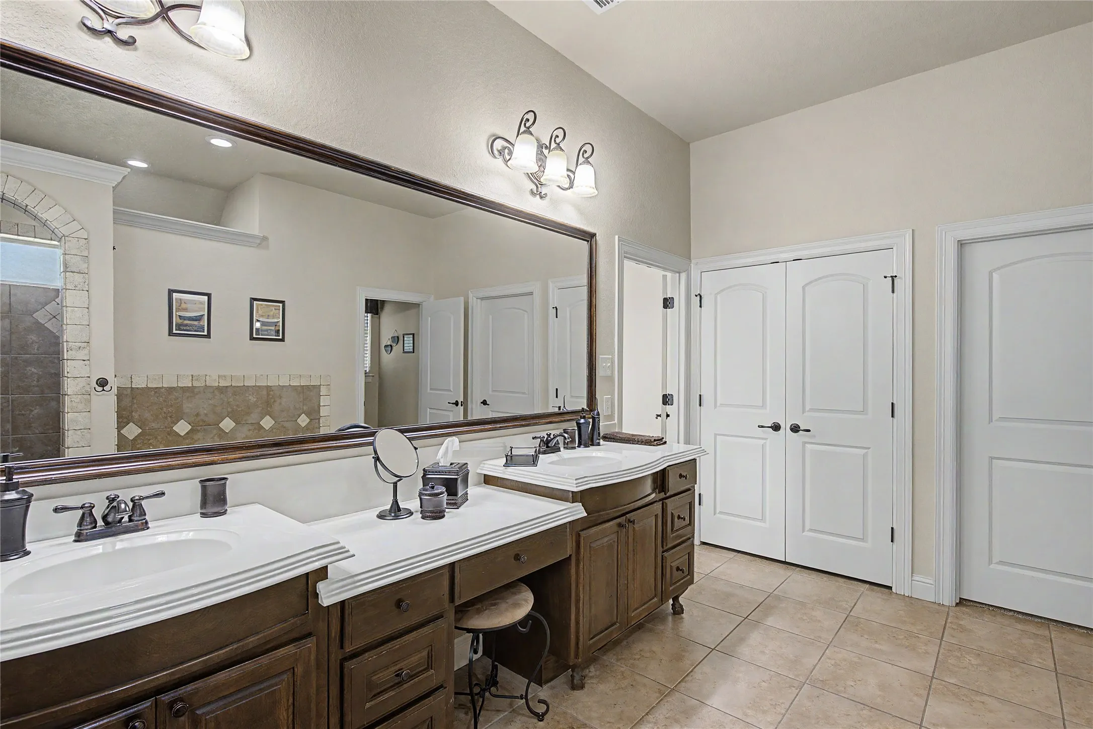 Linen closet in primary bathroom for extra storage