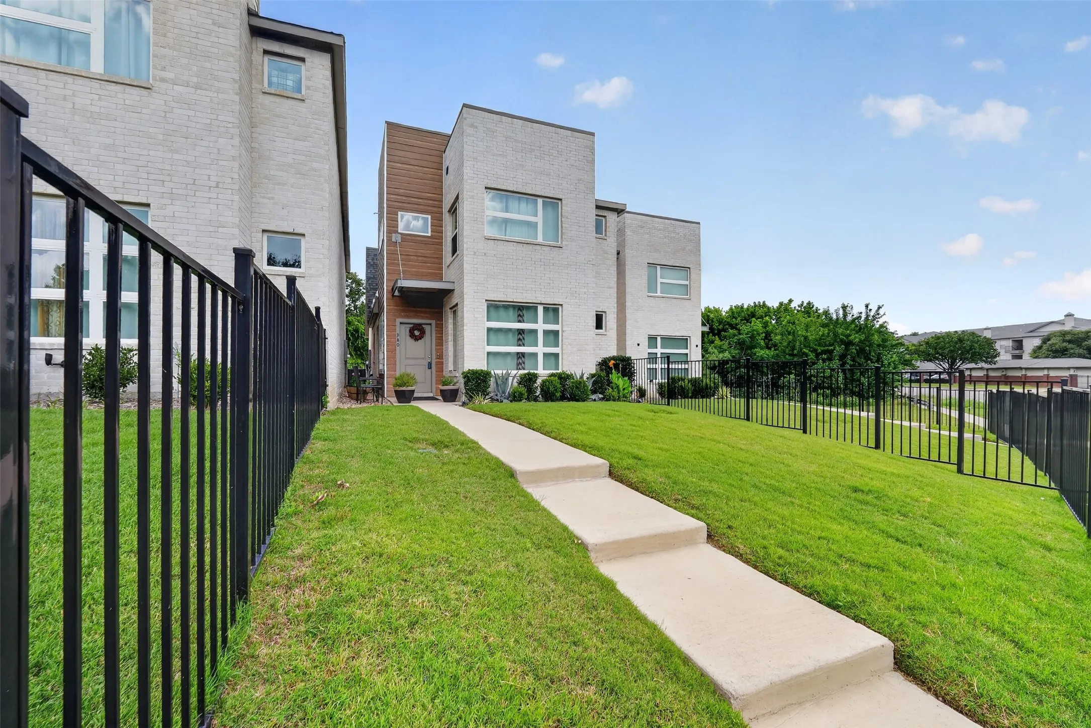 Steps leading to the front of the home and welcoming entry.