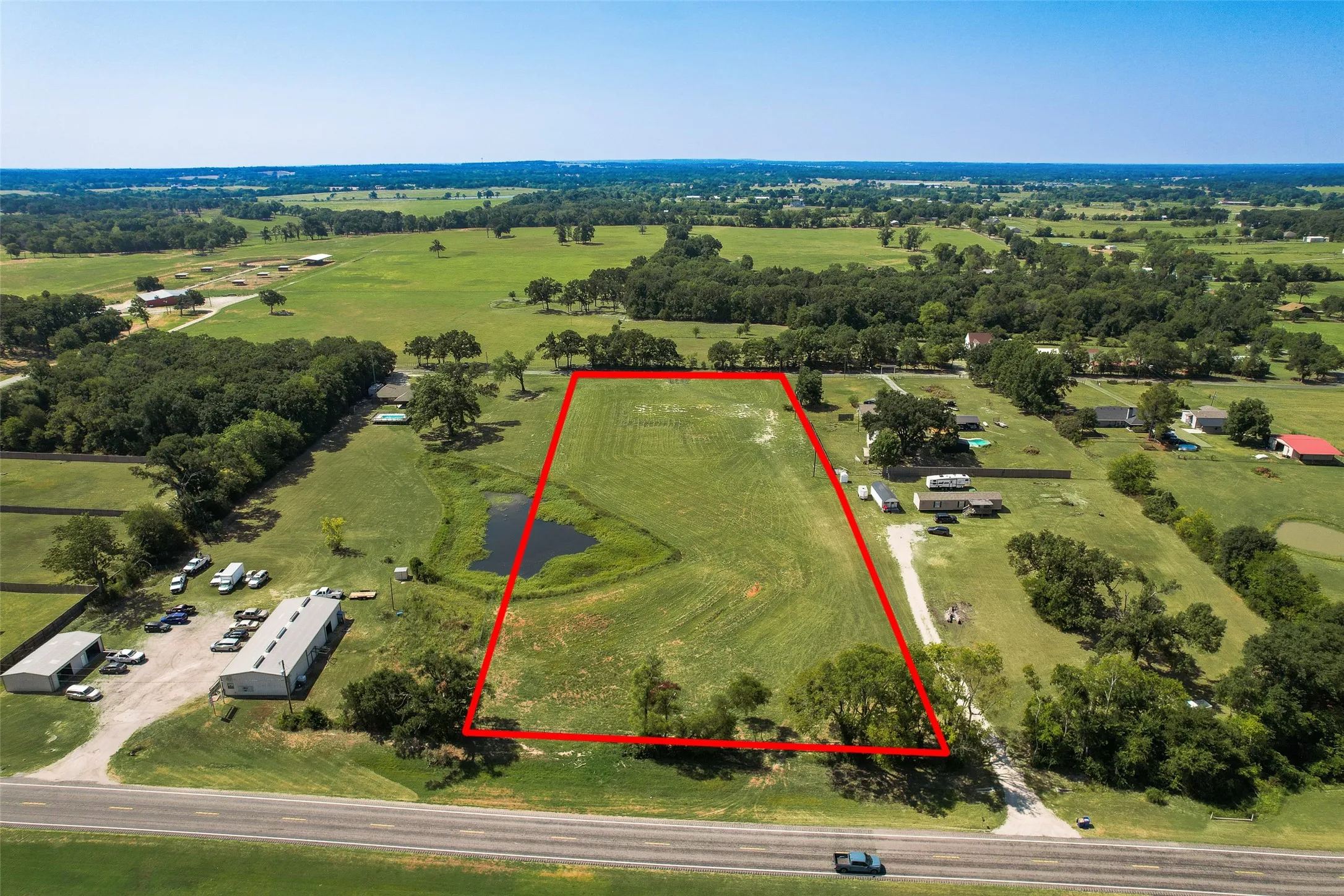 250 ft of State Highway road frontage and 250 ft of County Road frontage.
