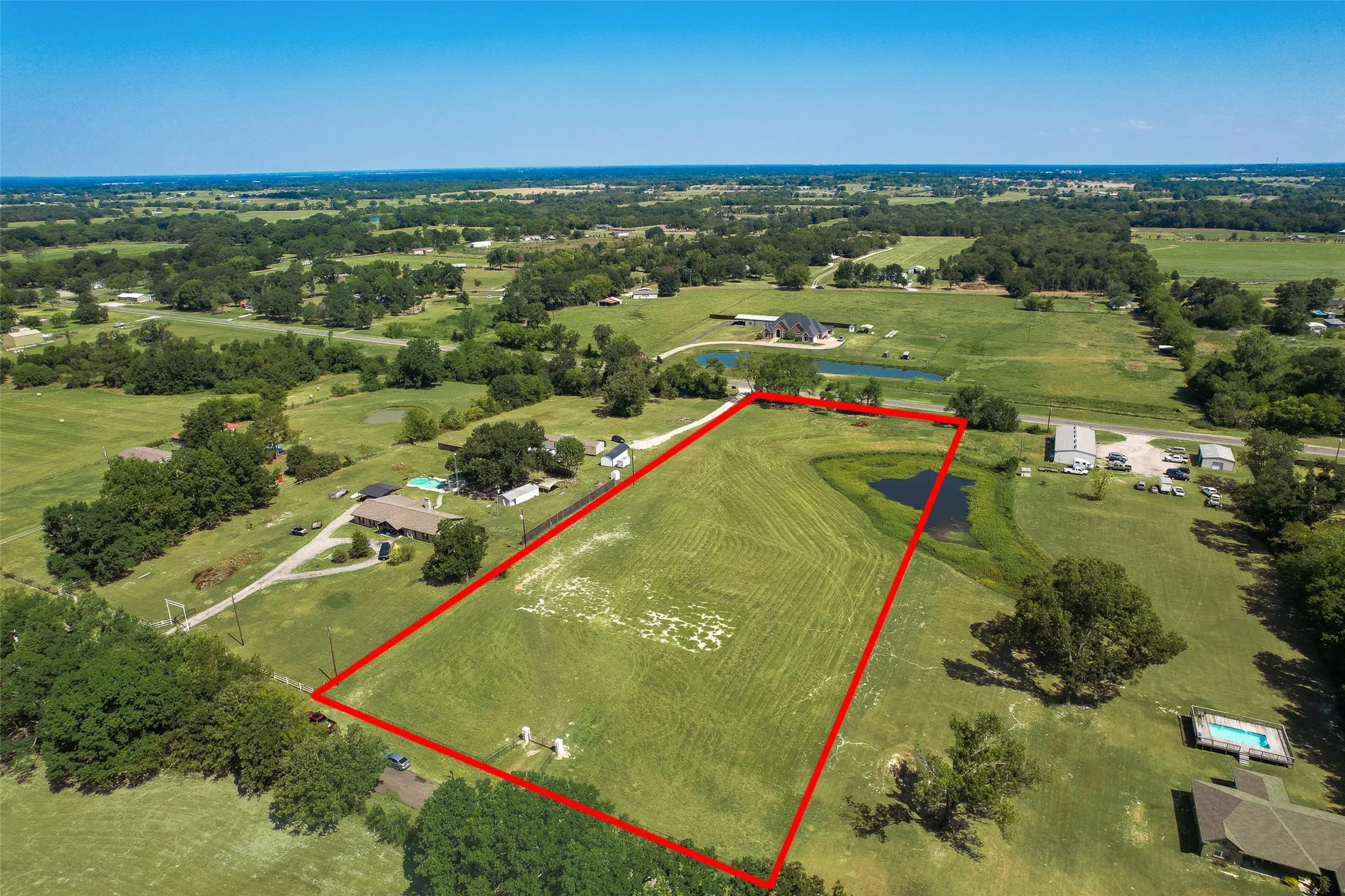 Access from 554 Vz County Road 2517 or Hwy 243. 250 ft of road frontage on Highway and County Rd.