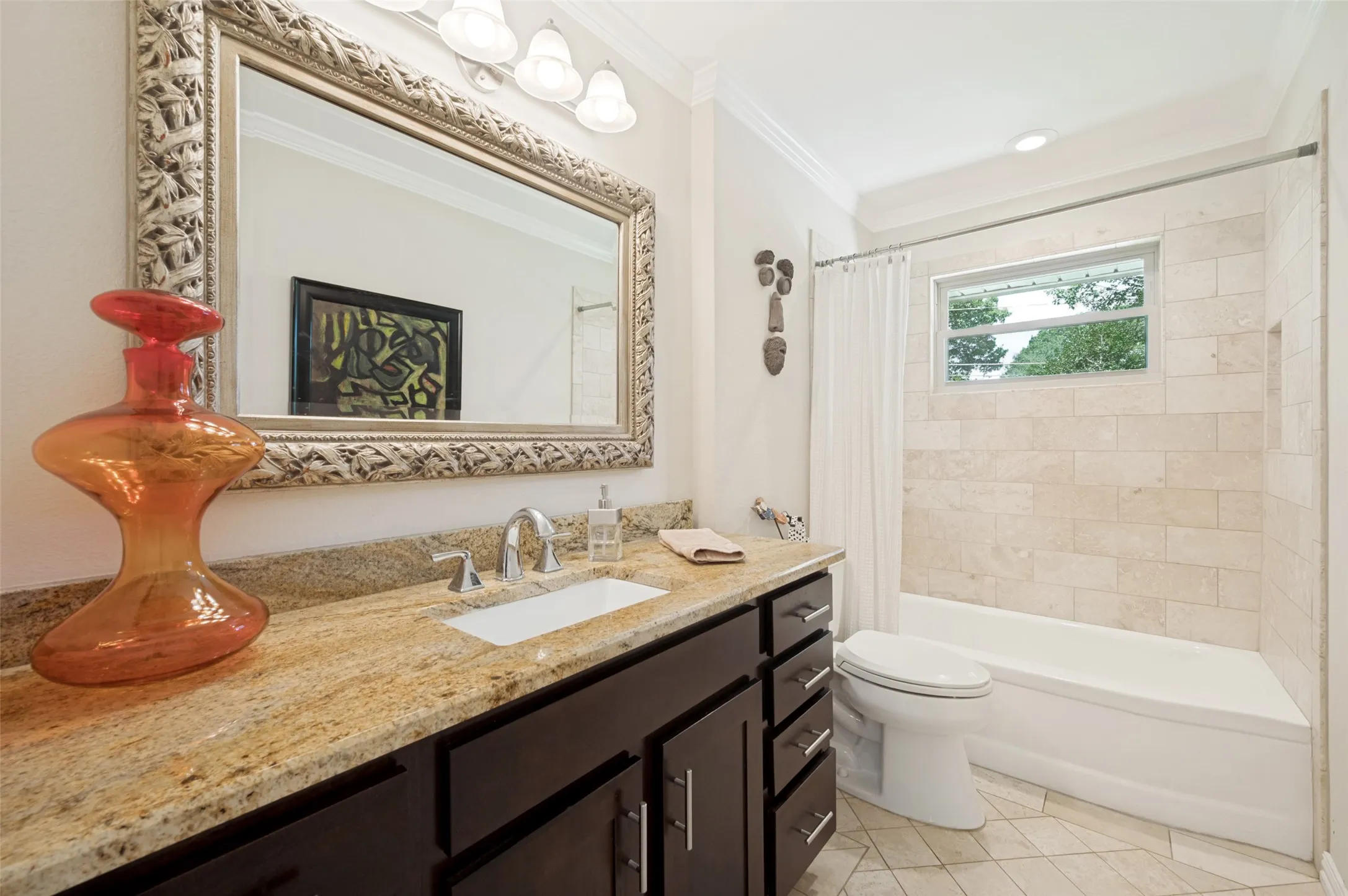 2nd full Bathroom featuring a dark wood-finish vanity with a granite countertop, undermount sink, and chrome faucet