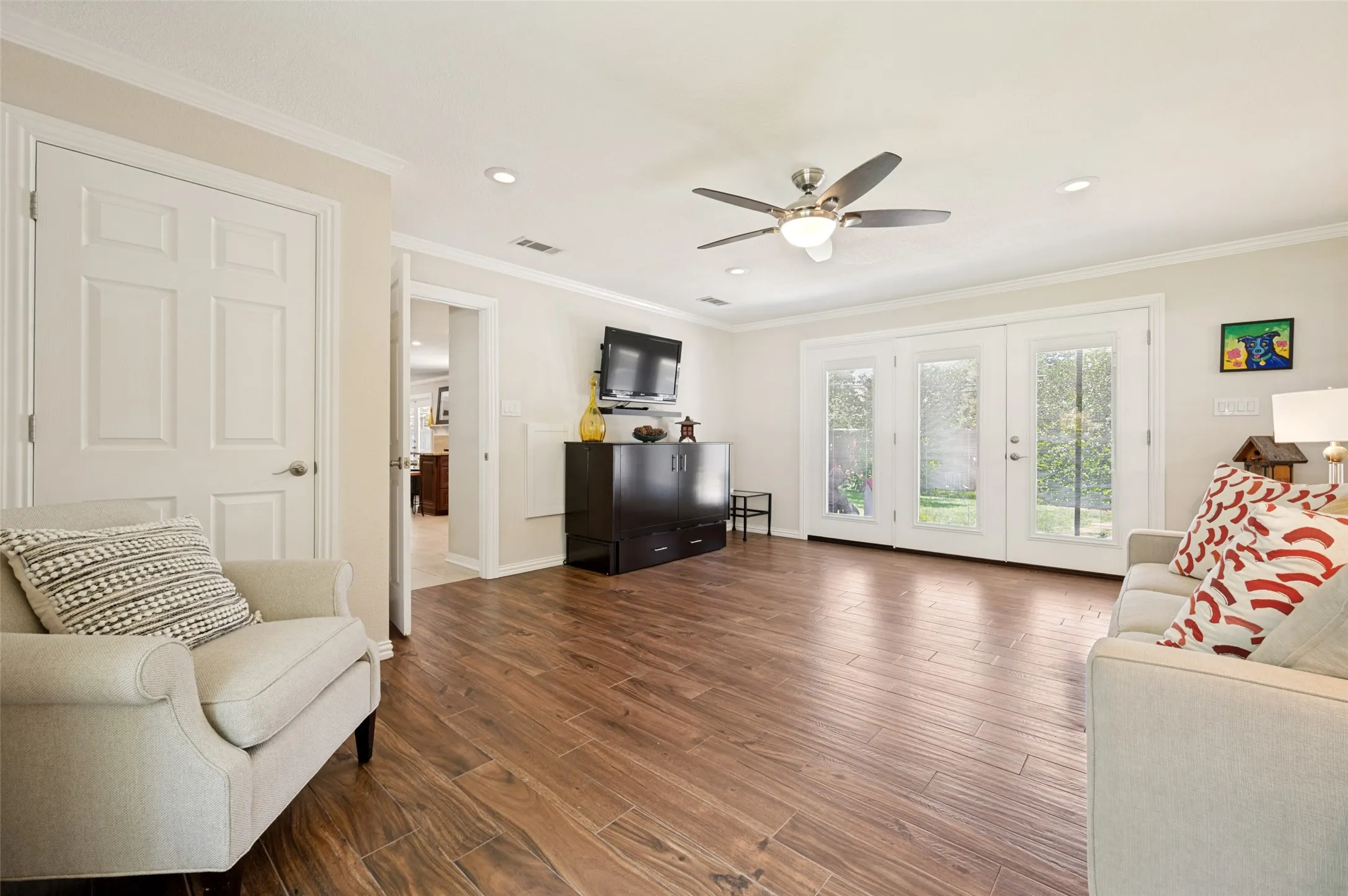 Another angle of the 2nd living area. Patio doors to the backyard and patio