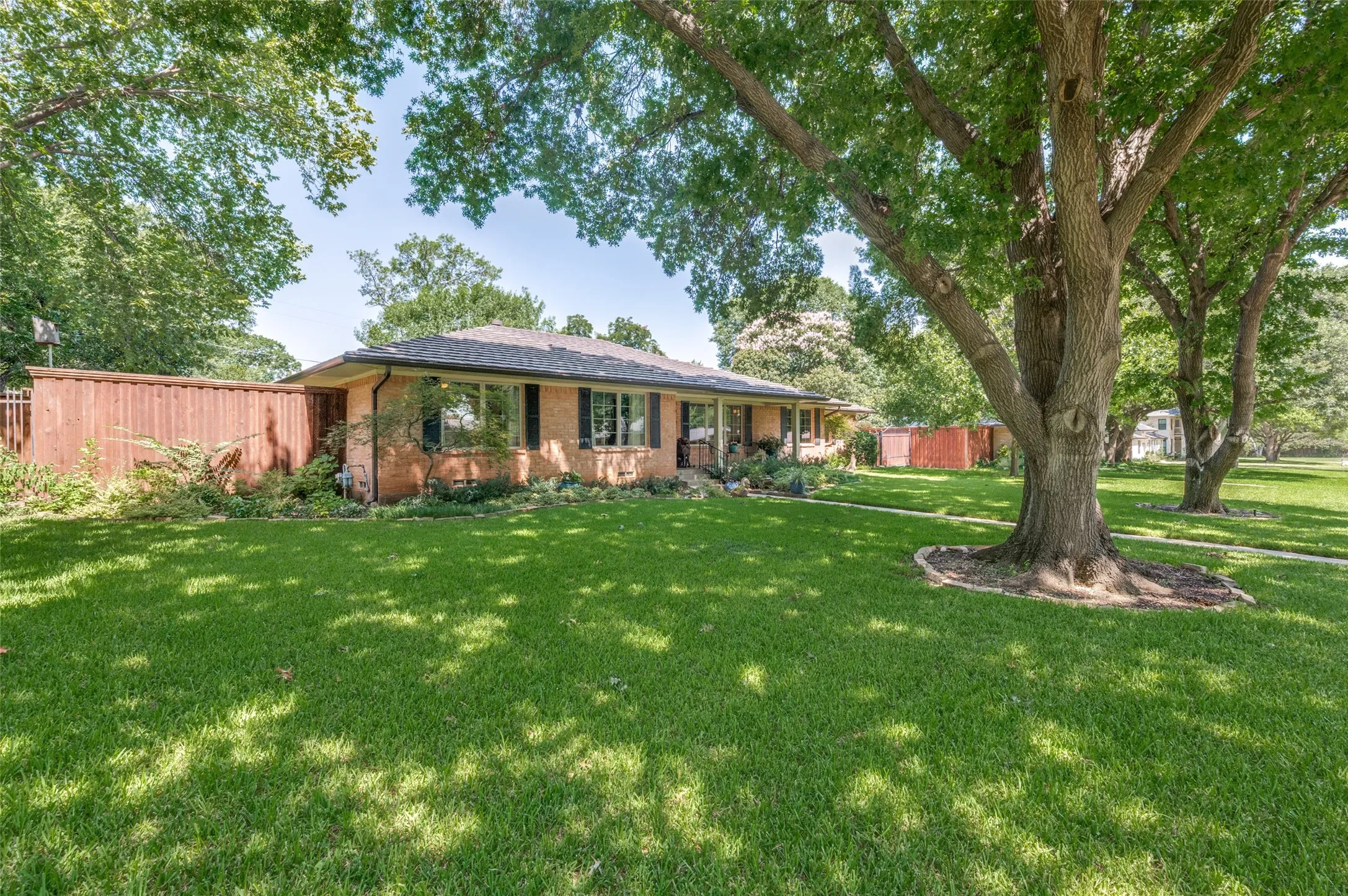 Expansive front lawn with mature shade​​‌​​​​‌​​‌‌​‌‌​​​‌‌​‌​‌​‌​​​‌​​ trees