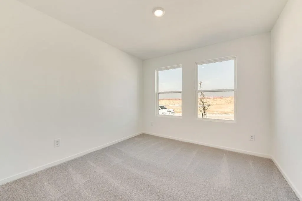 Empty room with light carpet