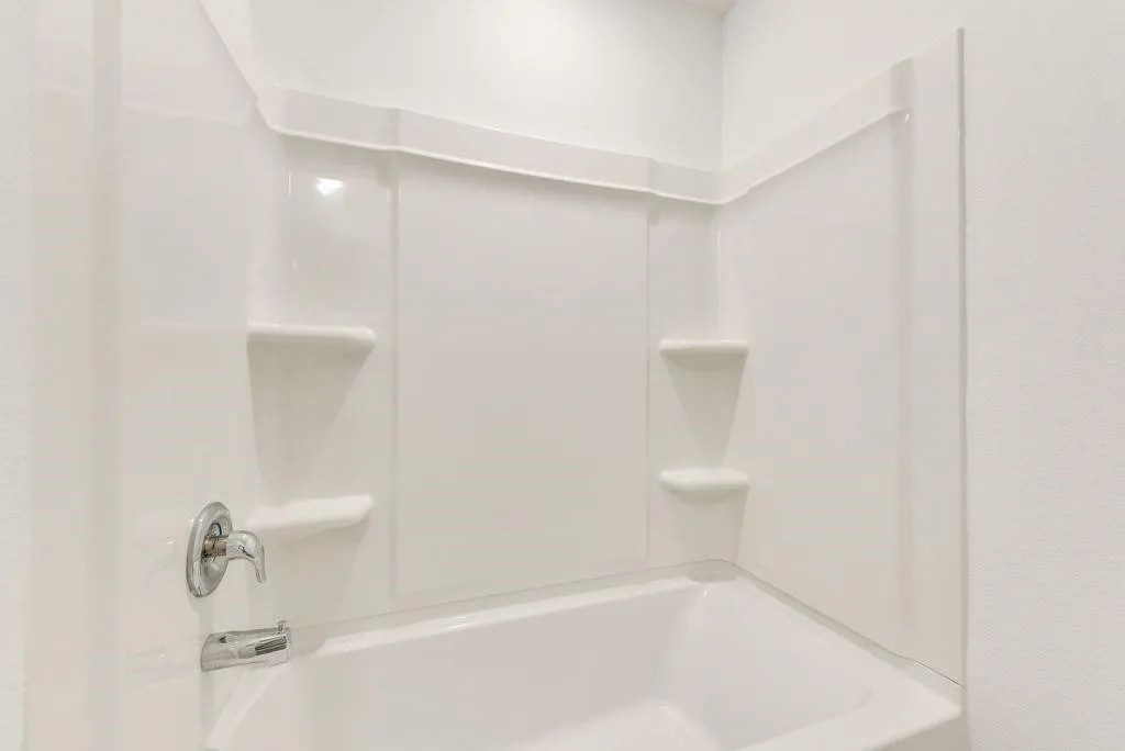 Bathroom featuring  shower combination