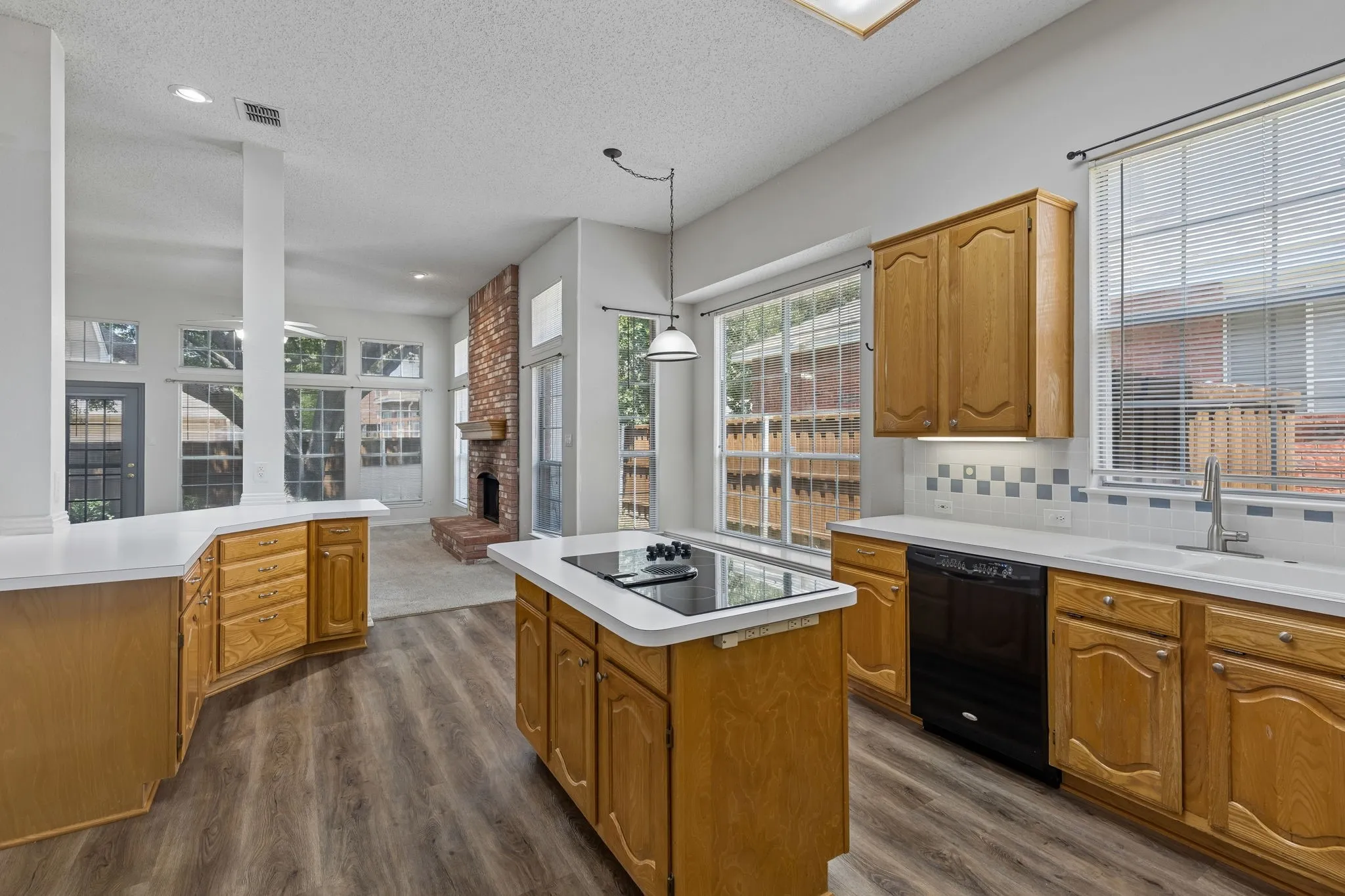 Kitchen open to family room. Full of natural light.