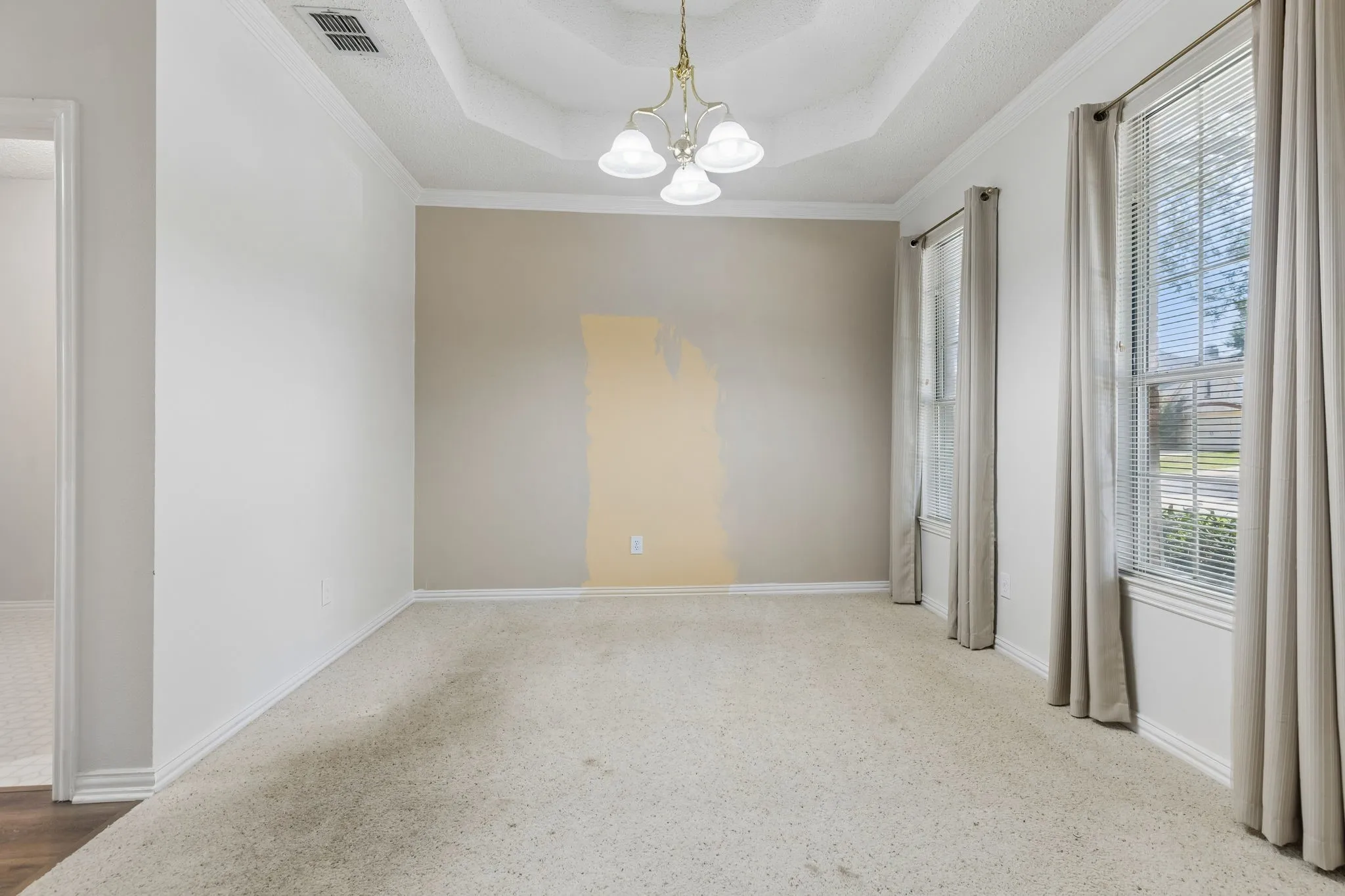 Back to the front is the formal dining room.