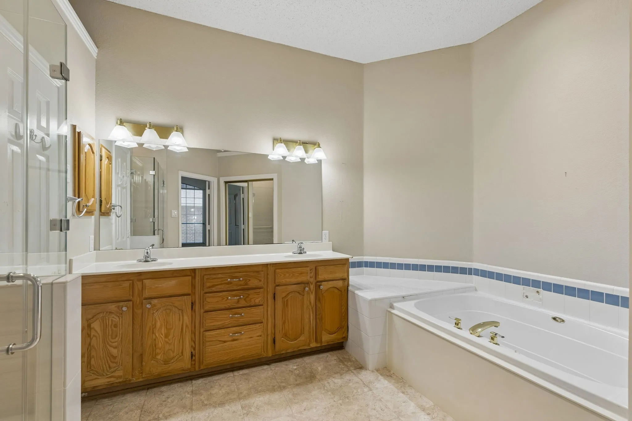 Primary Bathroom with jetted tub, renovated oversized shower