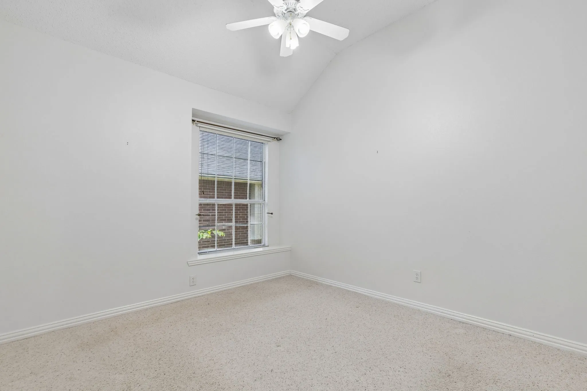 Another bedroom near the front split from the primary.
