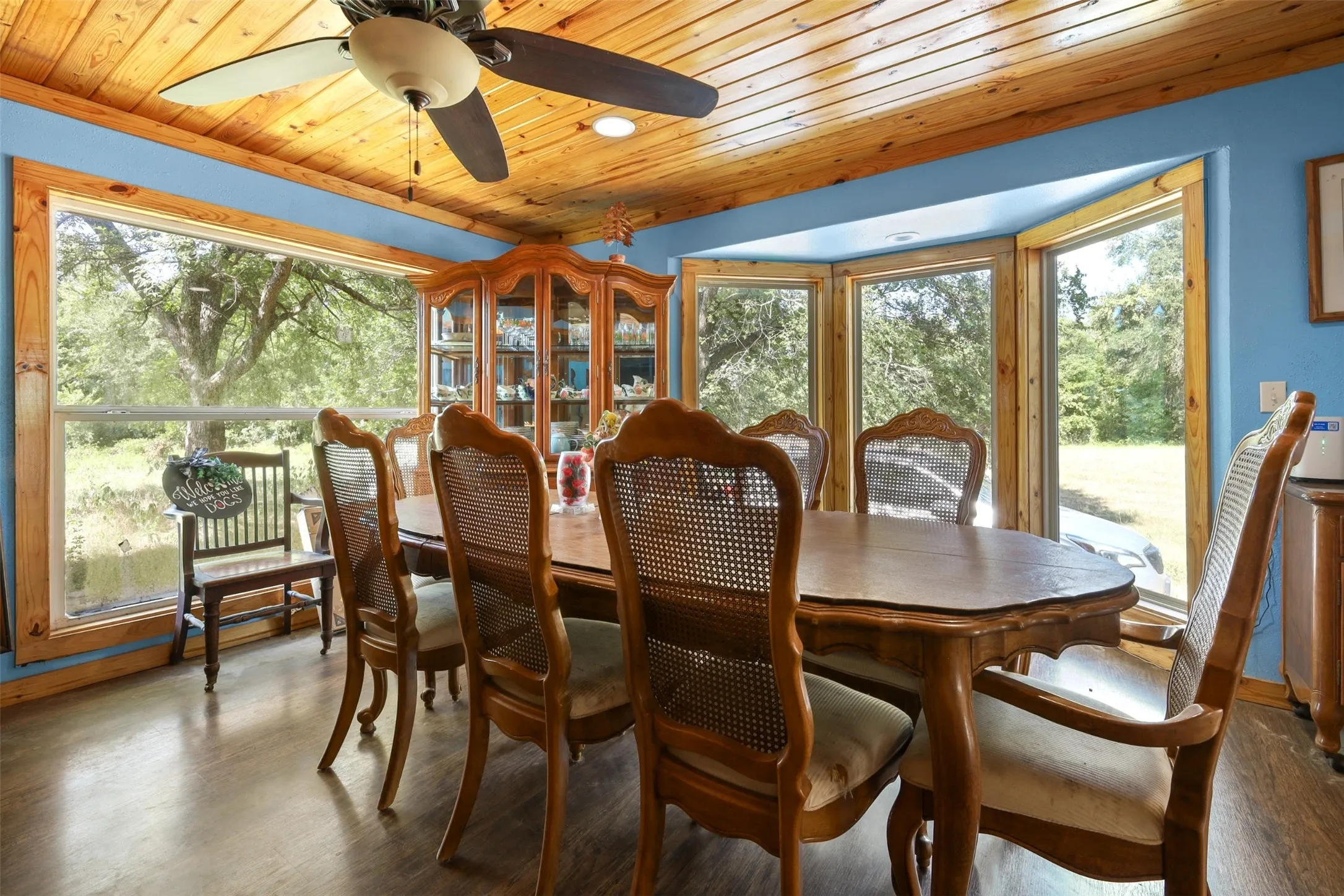 Wood-finish ceiling panels, wood-trim windows, and wood-finish flooring