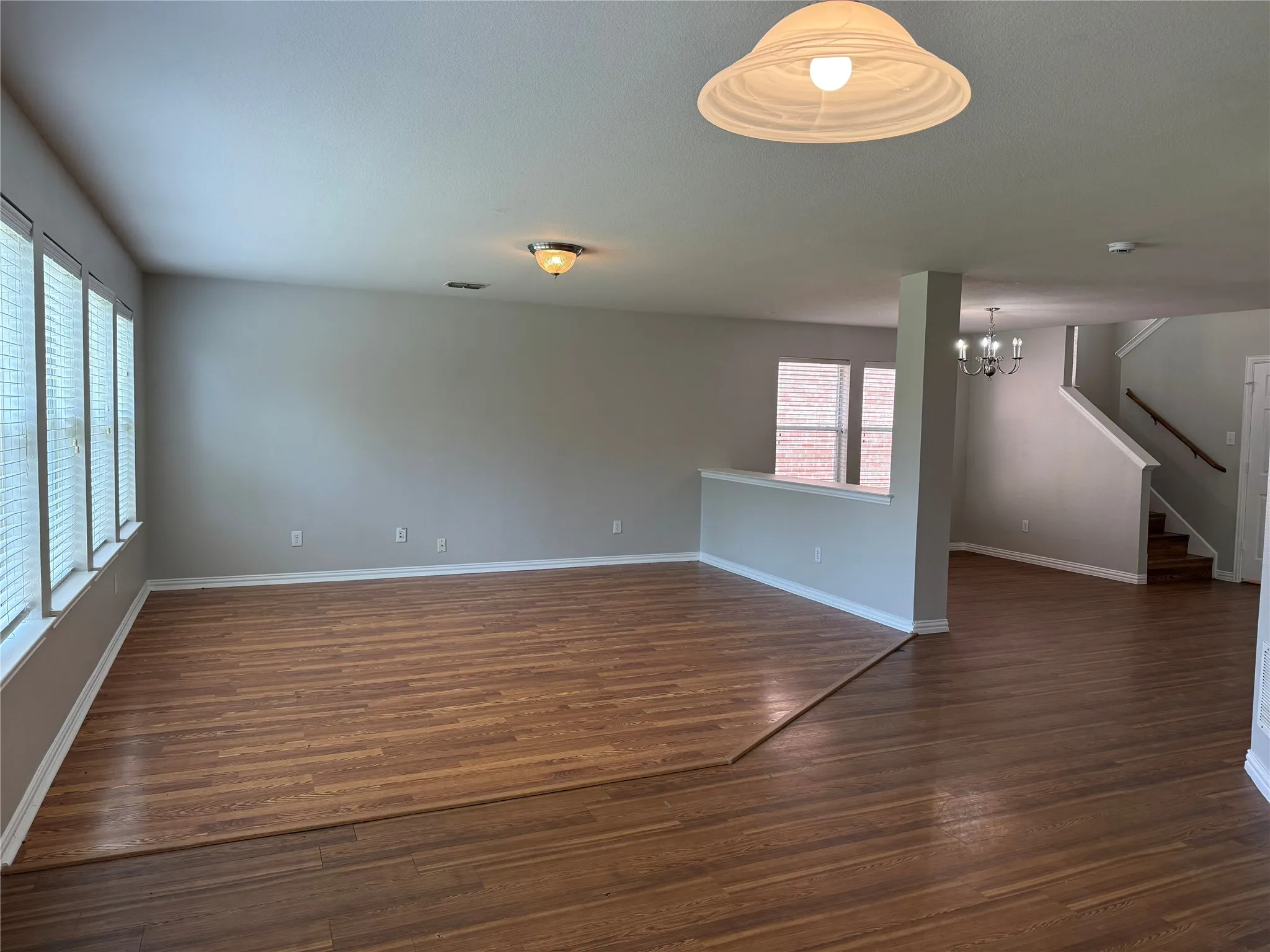 Living room open to kitchen and dining area