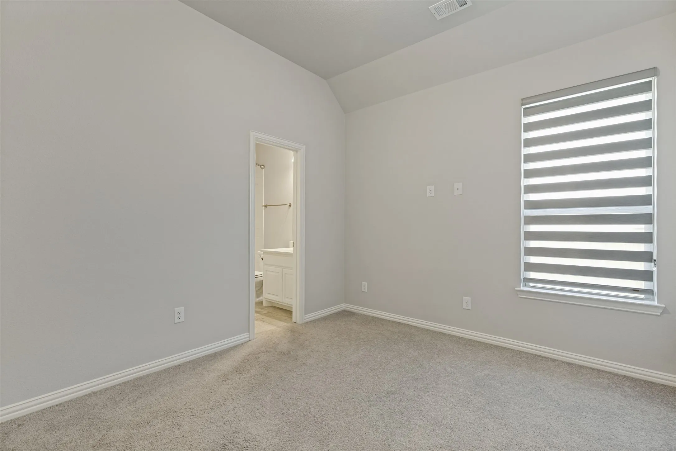 Private secondary bedroom with an ensuite bath