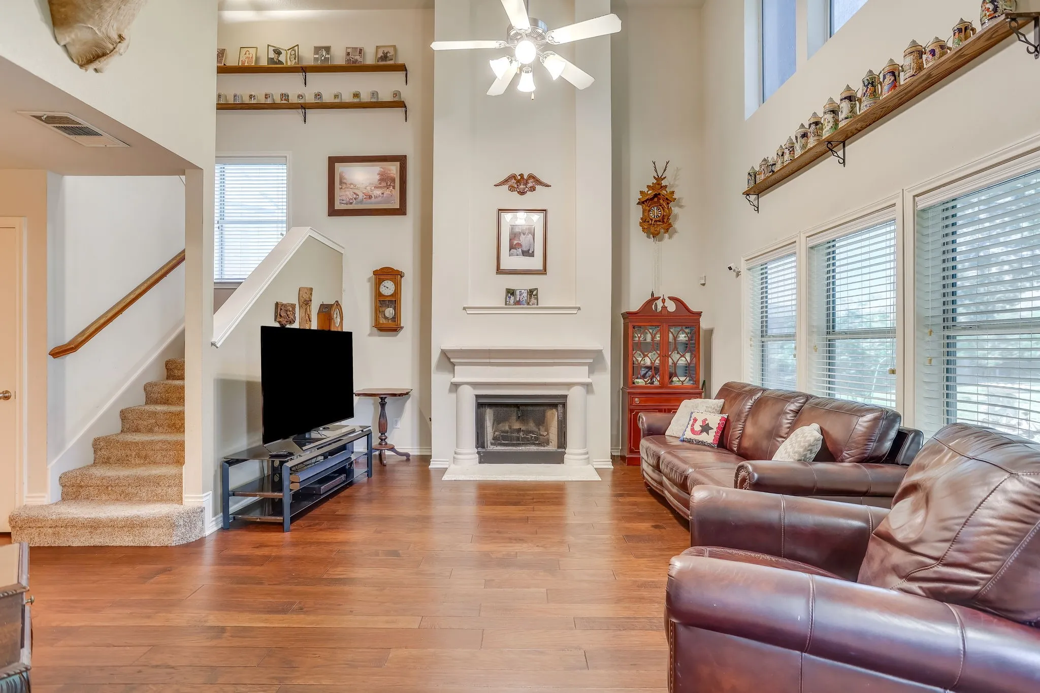 Vaulted ceiling, gorgeous wood floors throughout and lots of natural light
