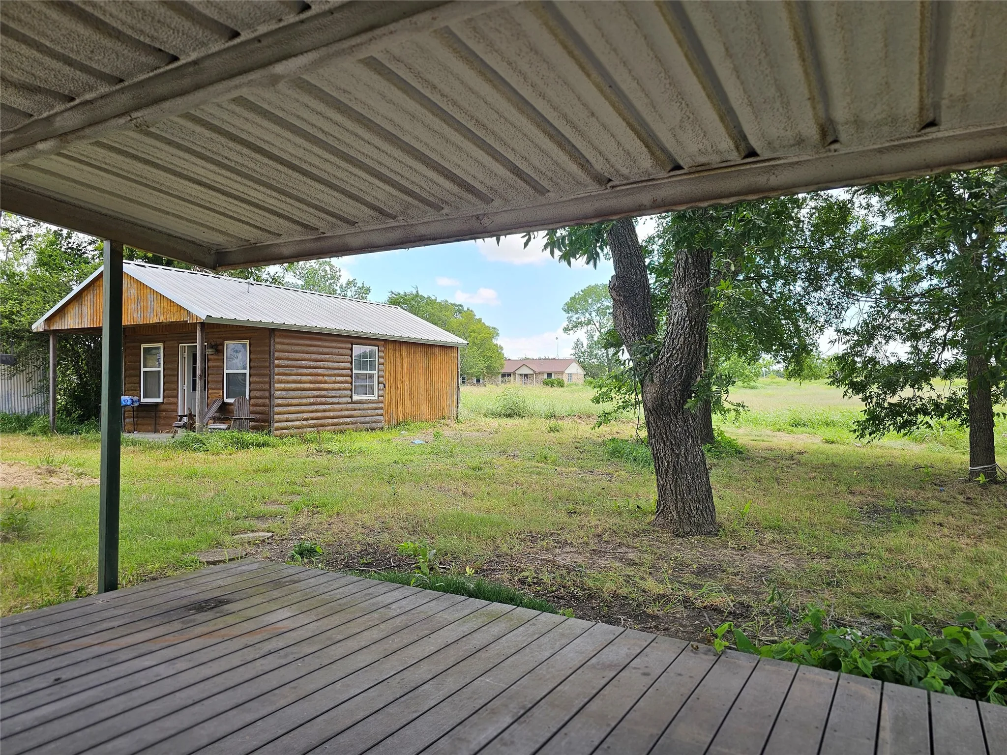 Back deck showing extra building