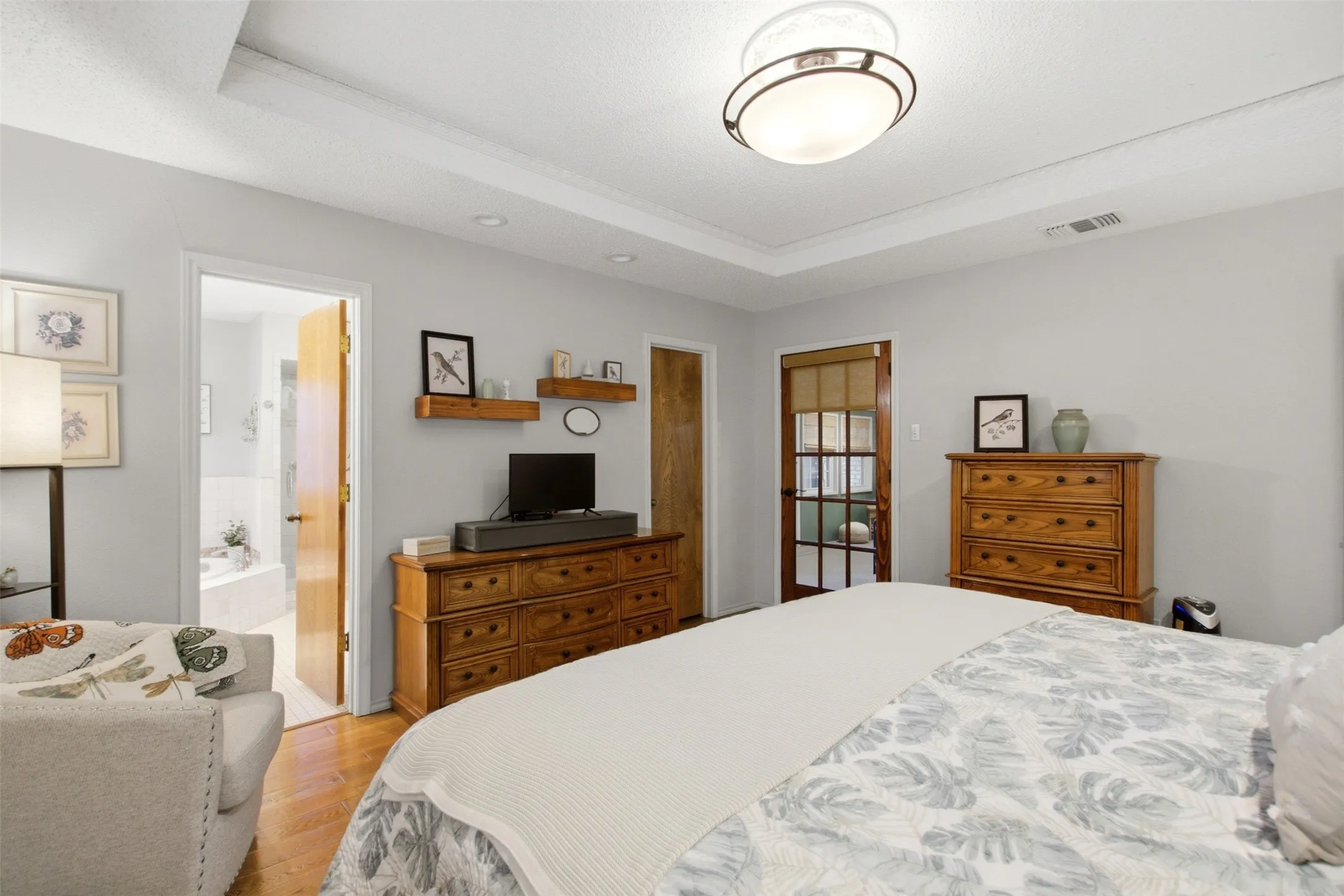 Recessed ceiling with an ornate semi-flush mount fixture